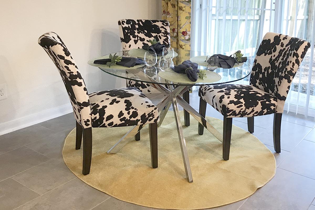 a table topped with lots of furniture