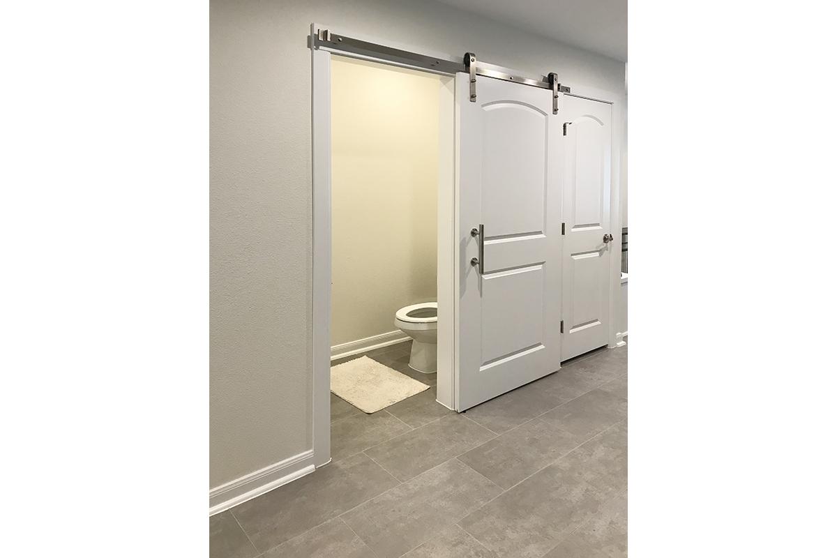 a white refrigerator freezer sitting in a room