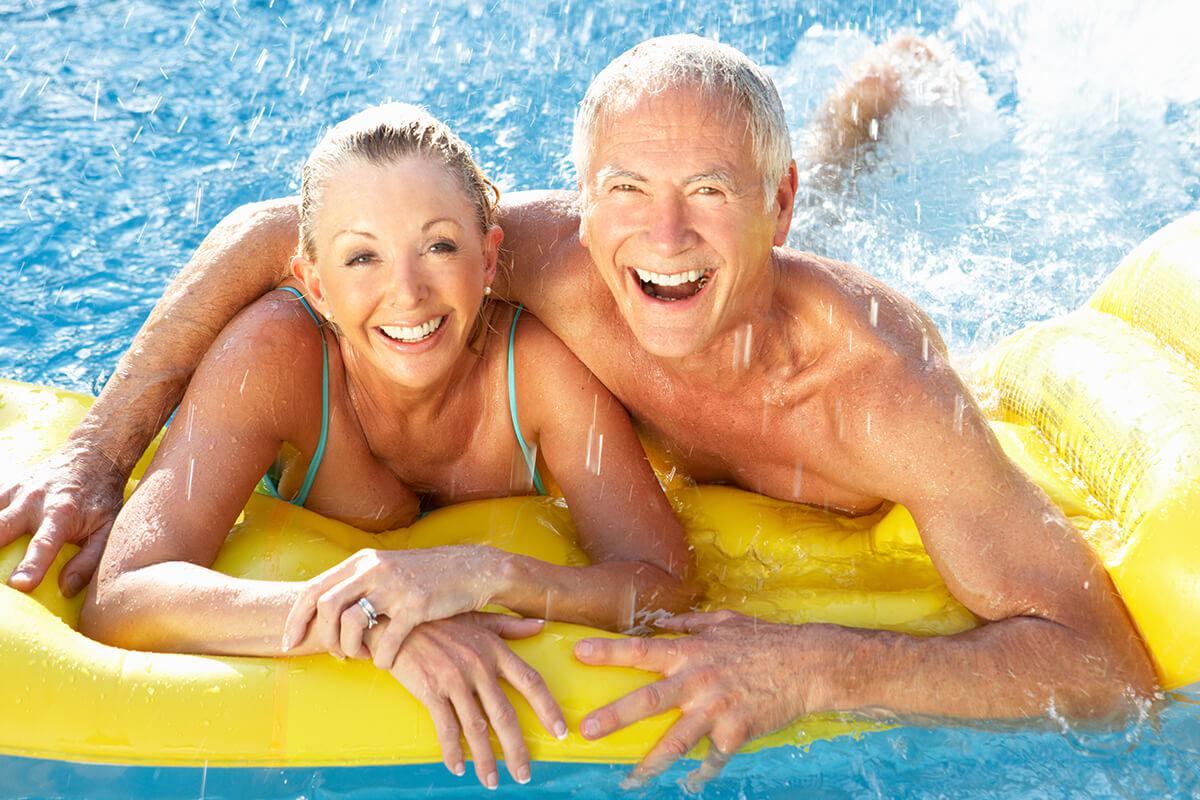Senior couple in pool.jpg