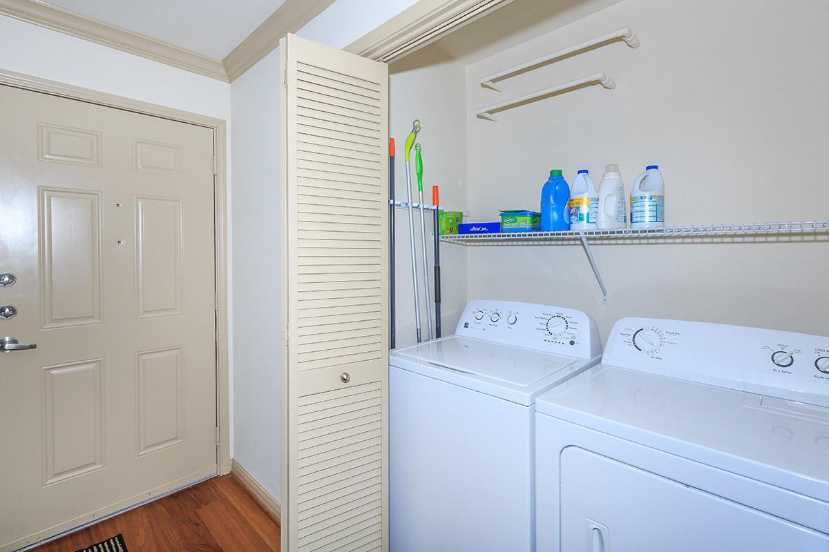 a white refrigerator freezer sitting in a room