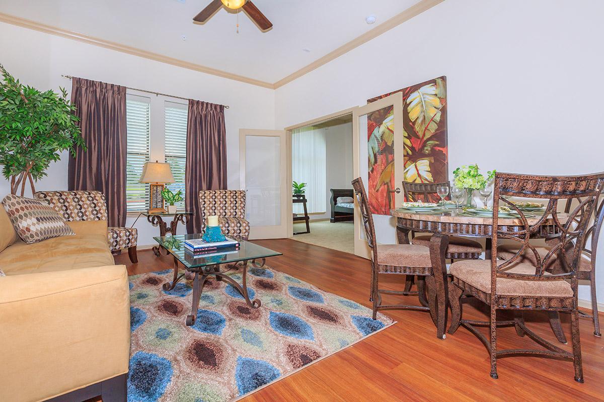 a living room filled with furniture and a fire place
