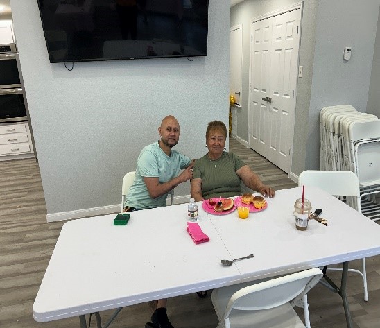 a man and a woman sitting at a table