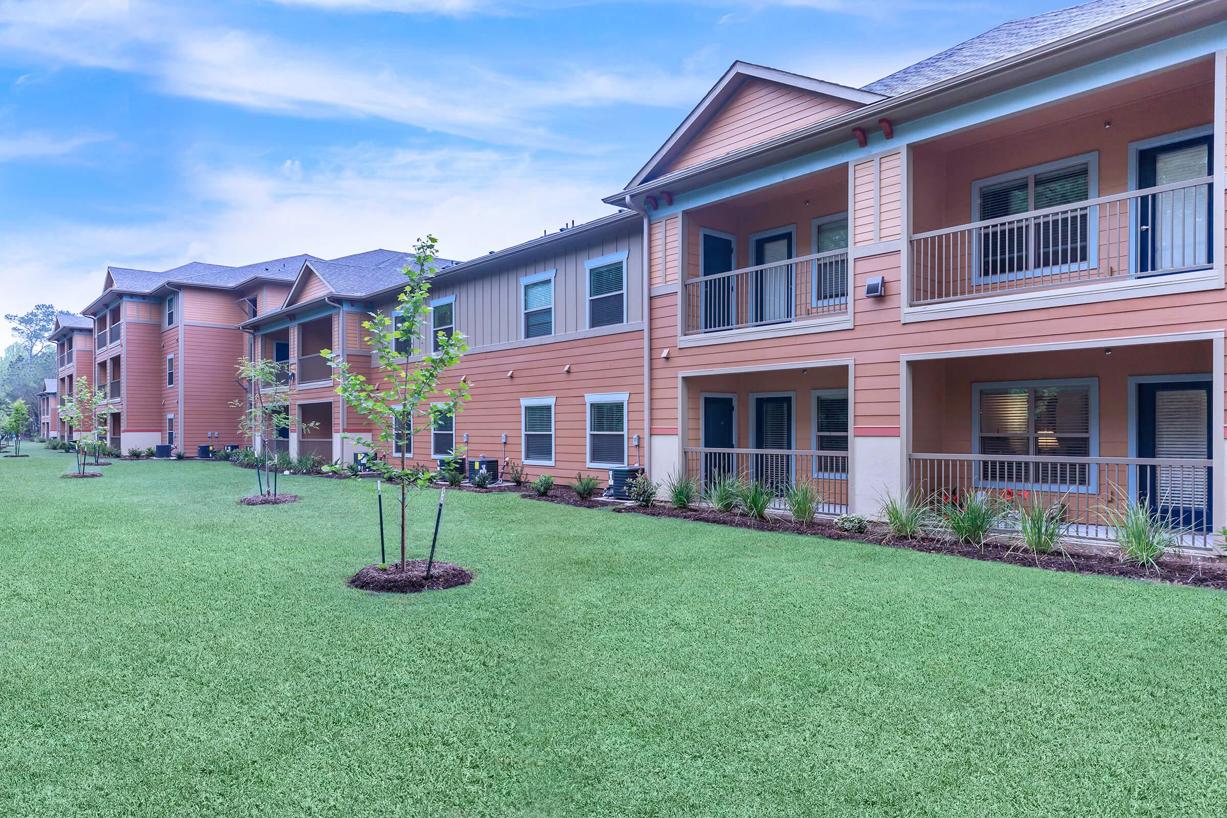 a large lawn in front of a building