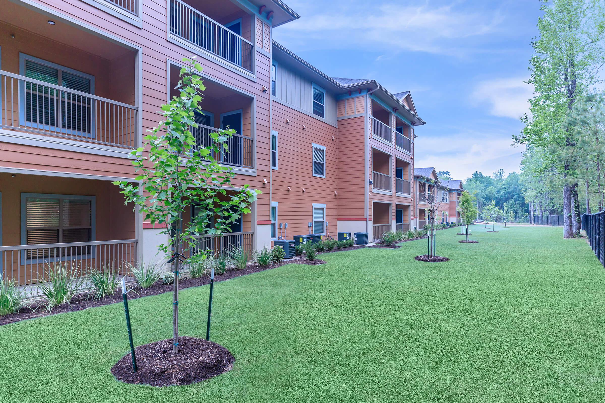 a large lawn in front of a building