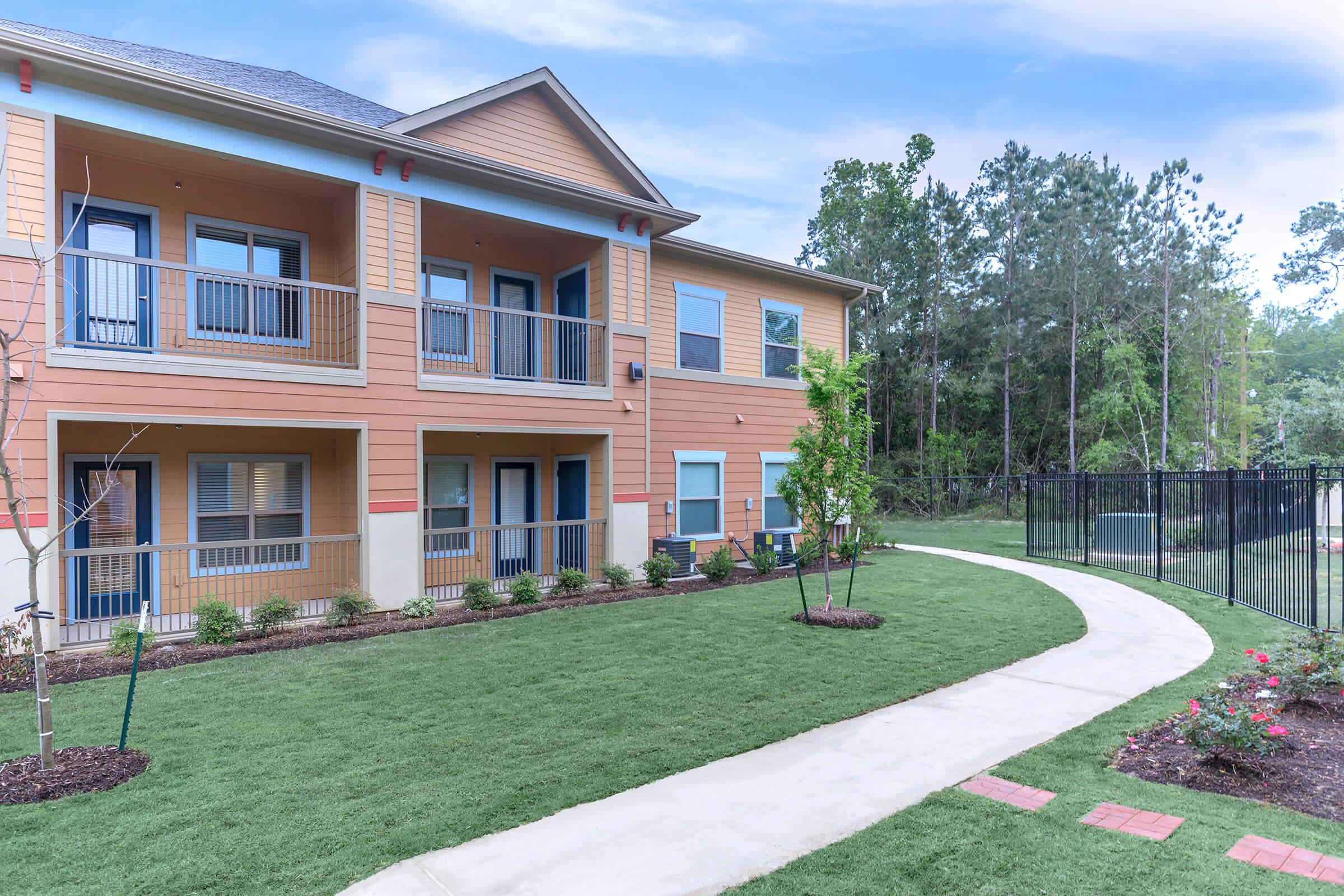 a large lawn in front of a building