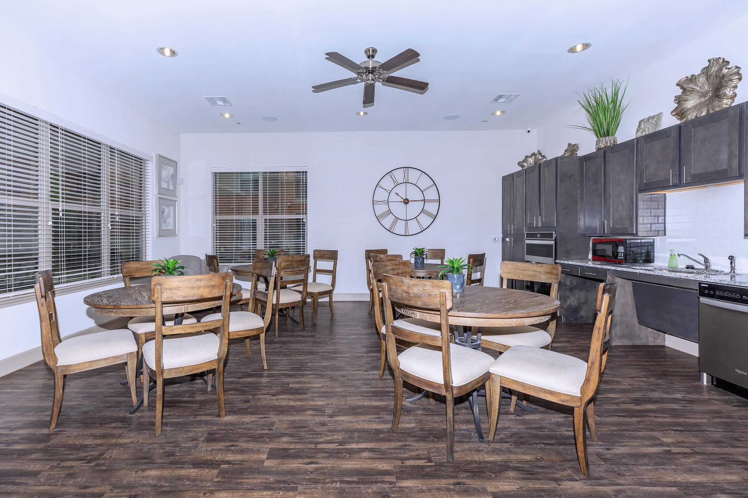 a living room filled with furniture on top of a wooden chair