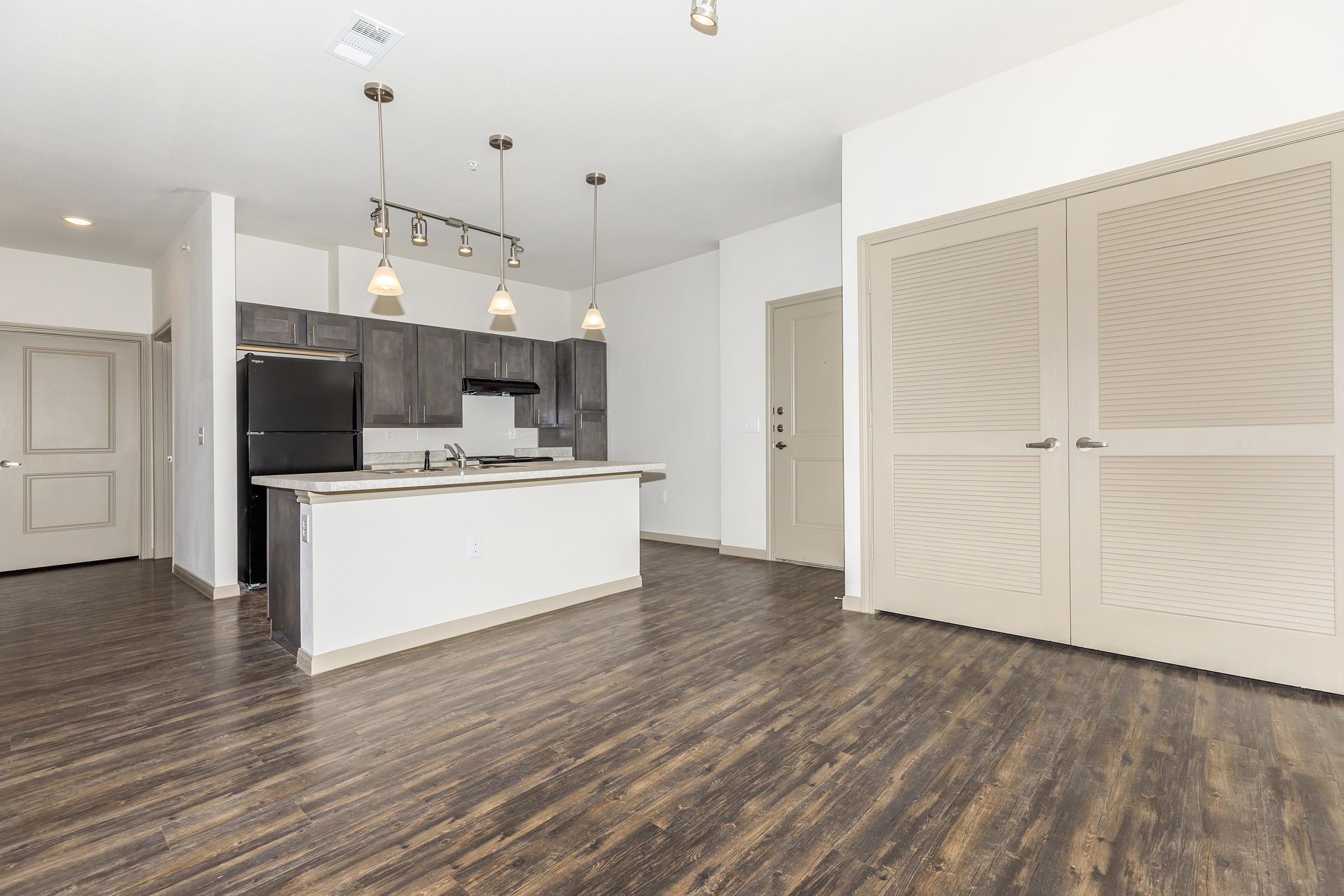 a large white refrigerator in a room