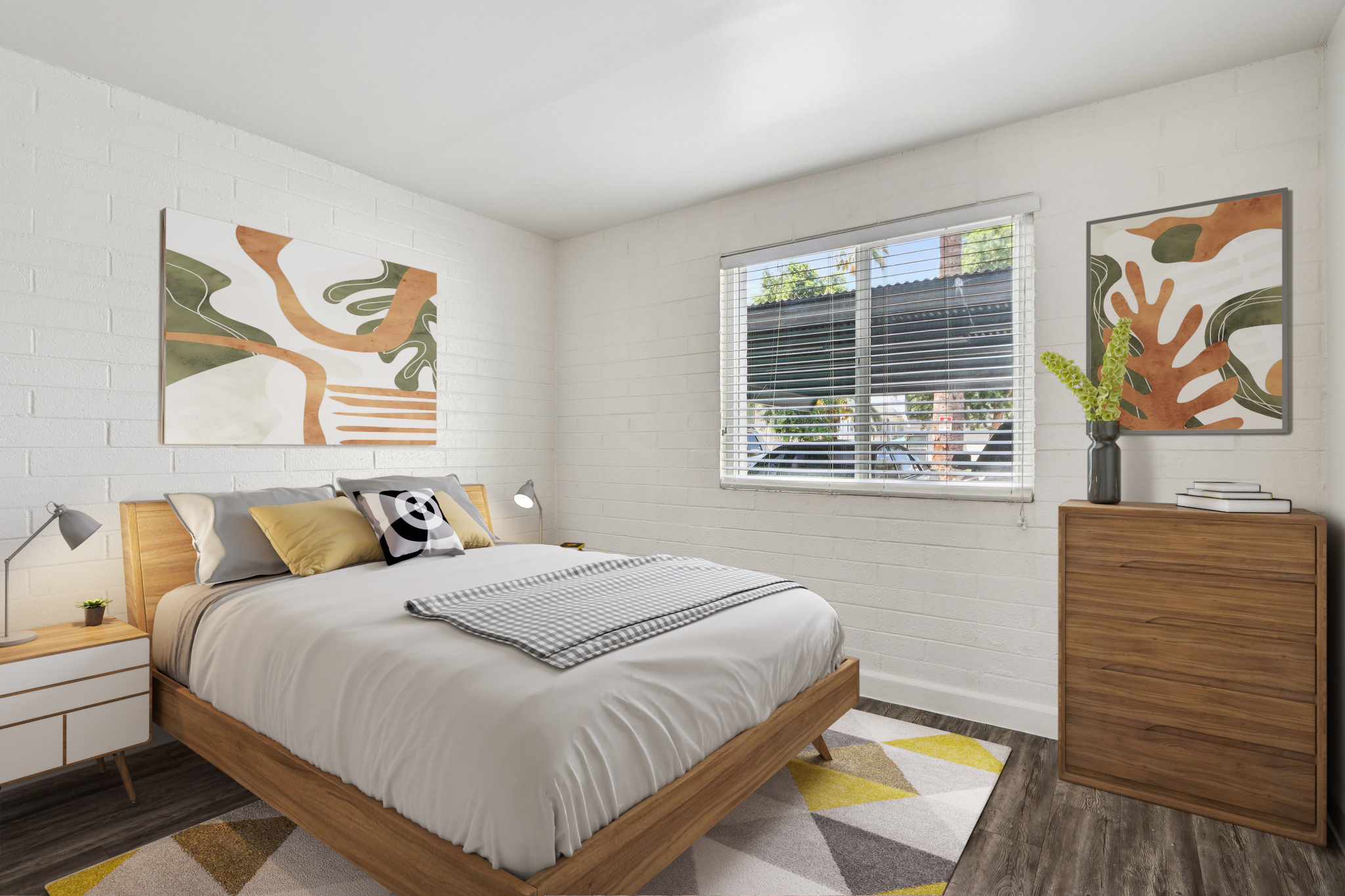 A well-lit modern bedroom featuring a wooden bed with a gray and white bedding set, decorative pillows, and a panda plush toy. Two abstract art pieces hang on the walls, complemented by a wooden nightstand with bedside lamps. A dresser is positioned in the corner, and natural light filters through the window with blinds.