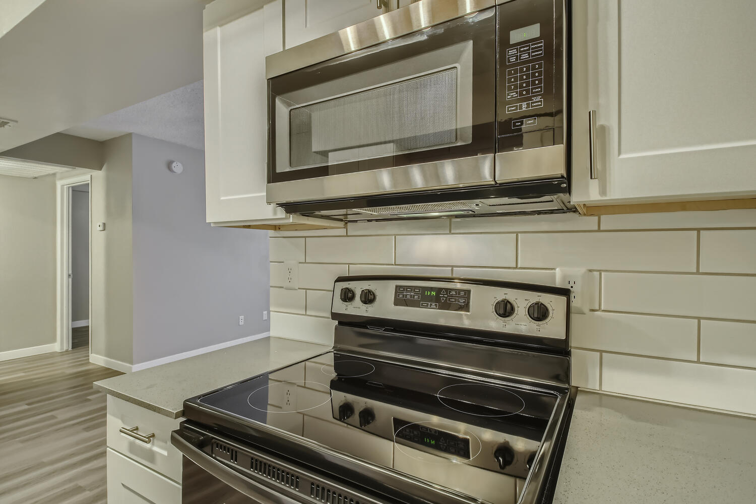Rise North Ridge stainless steel microwave and oven in a kitchen.