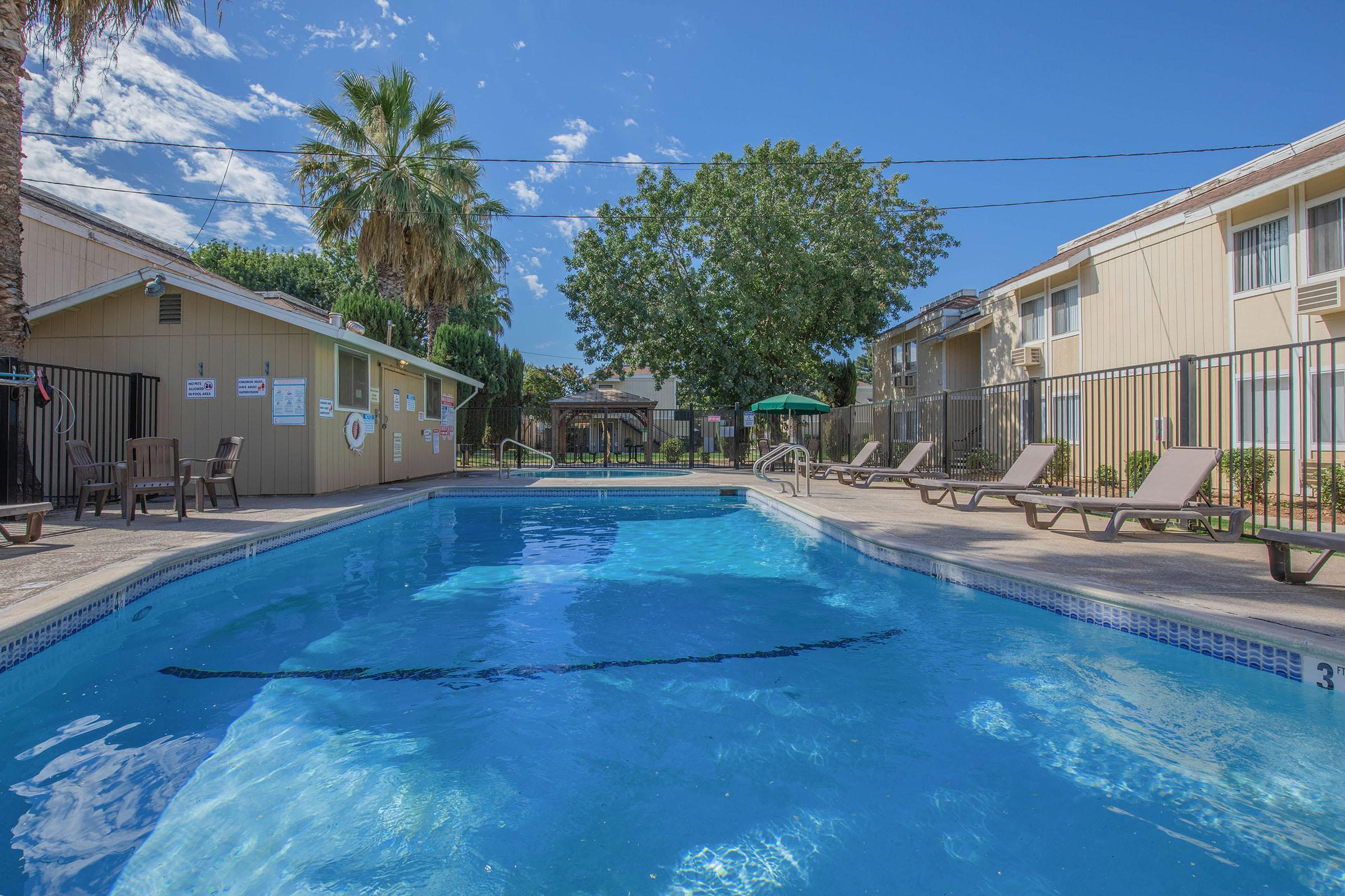 a house with a large pool of water