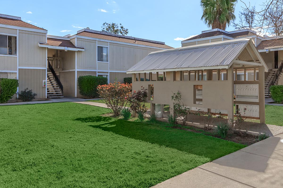 a large lawn in front of a house