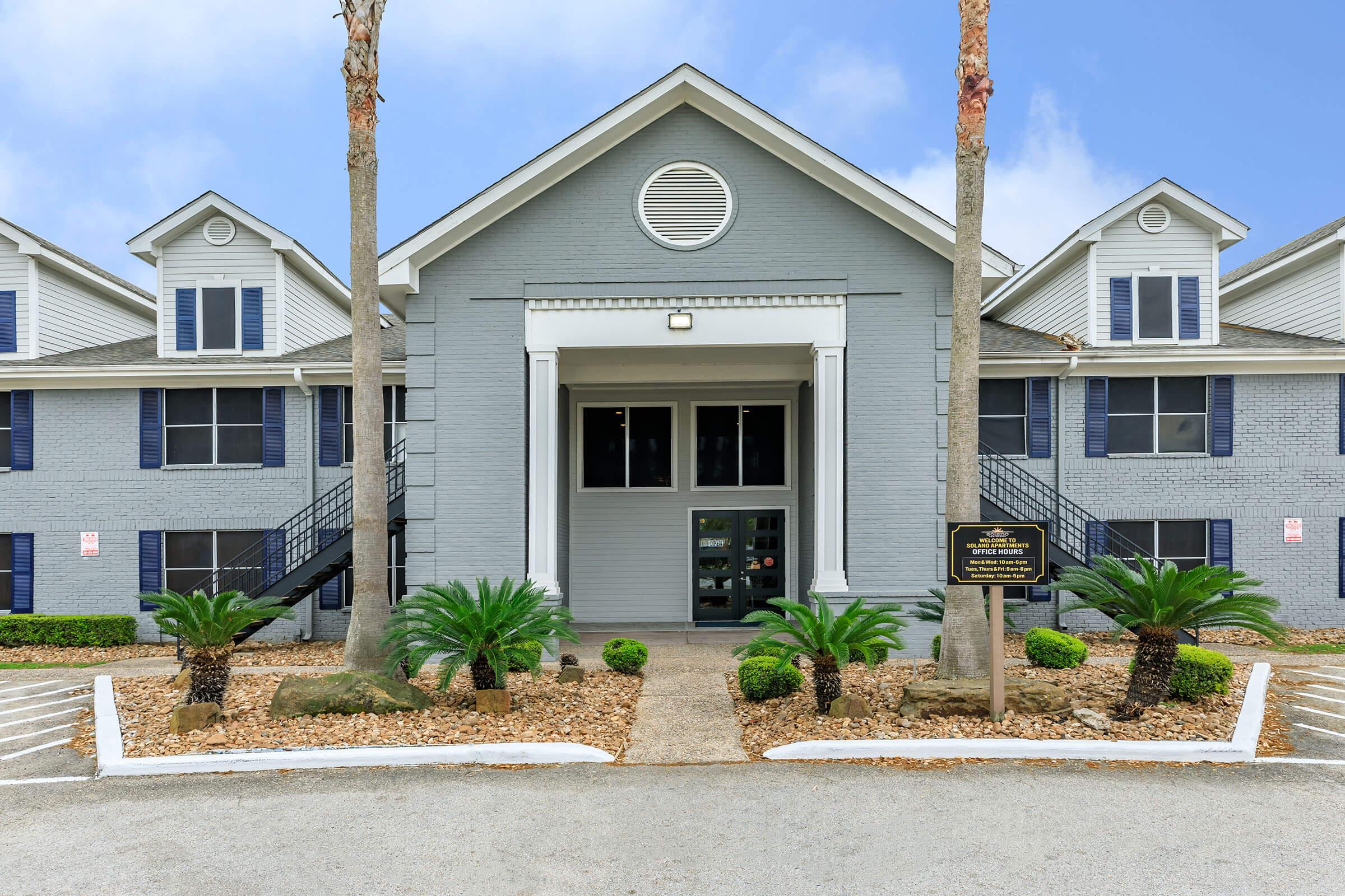 a house that is parked on the side of a building