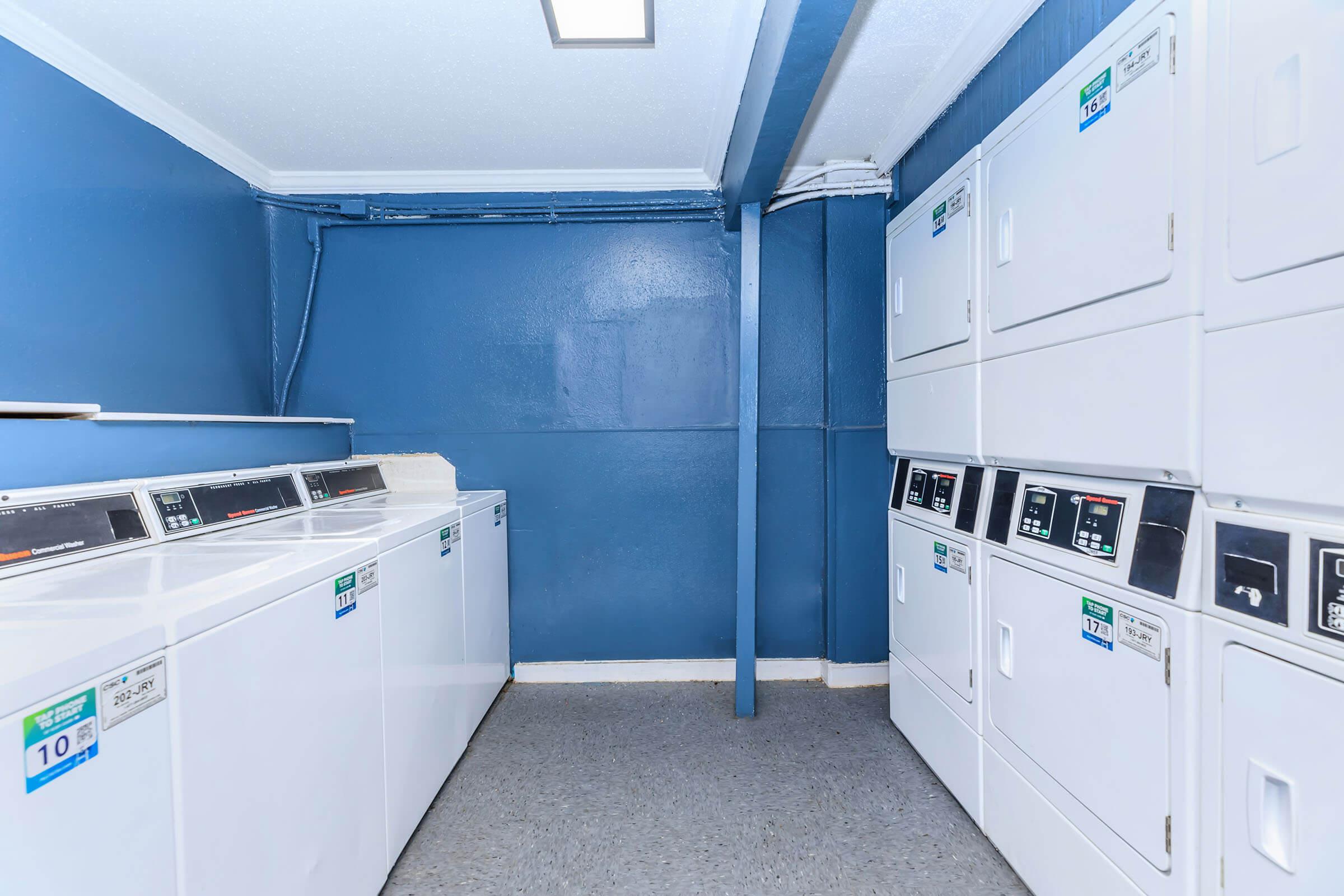 a kitchen with a blue background