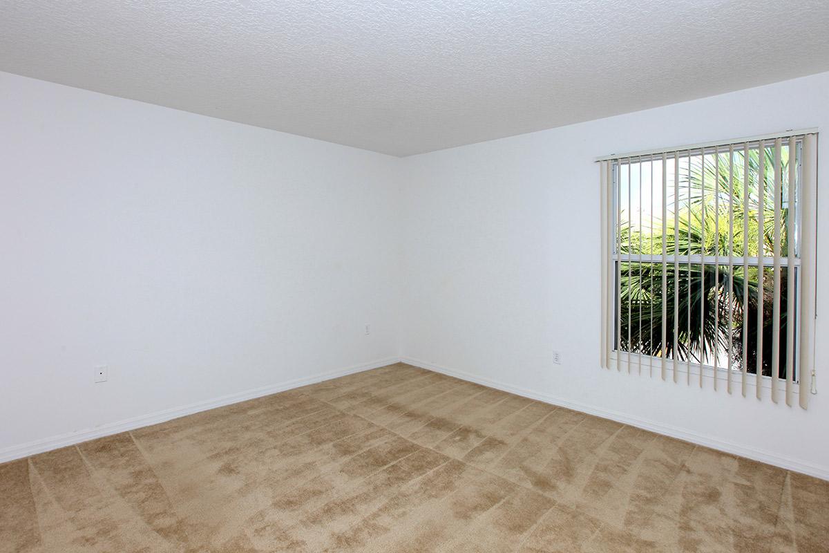 a living room next to a window