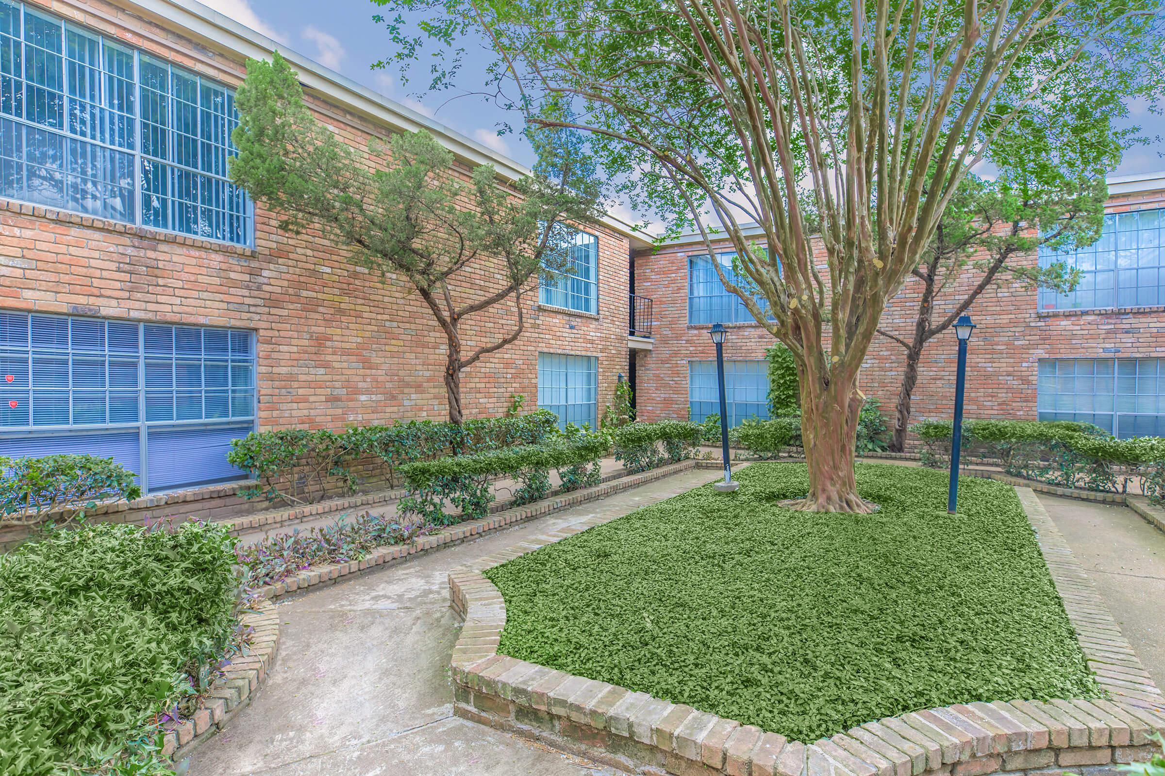 a garden in front of a building