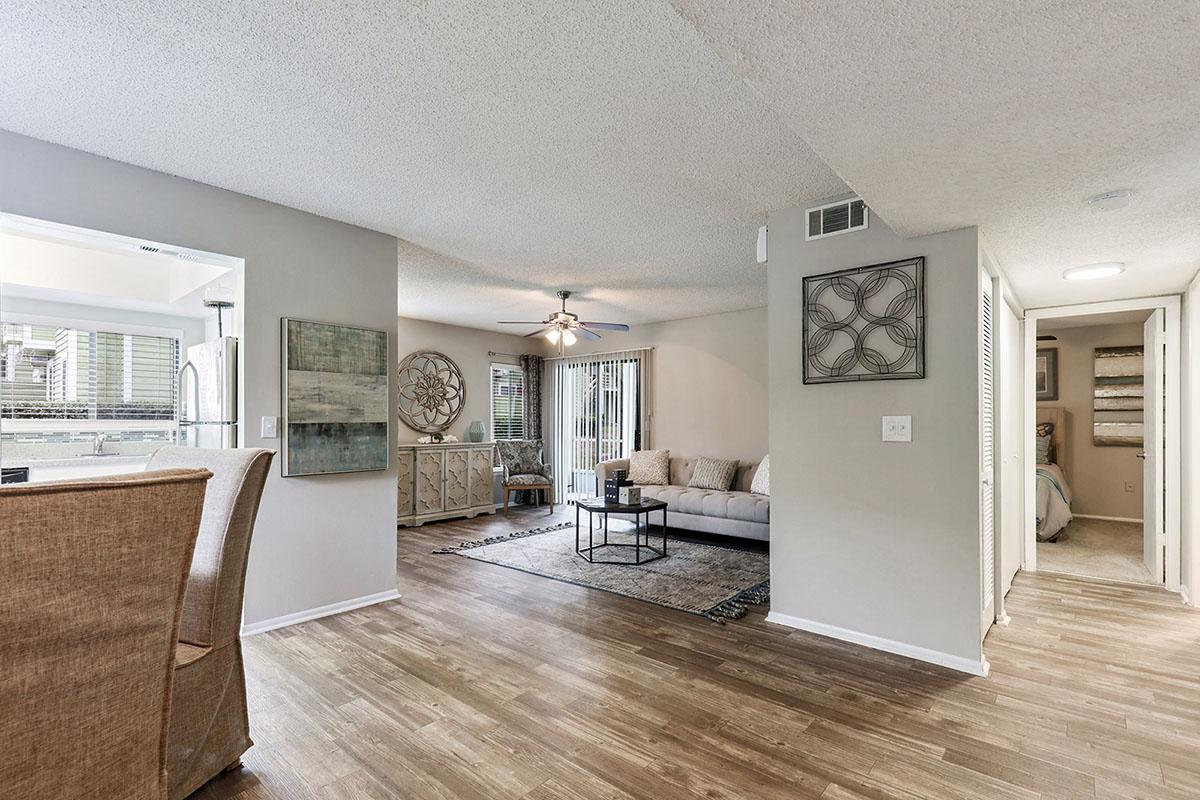 a living room filled with furniture and a fireplace