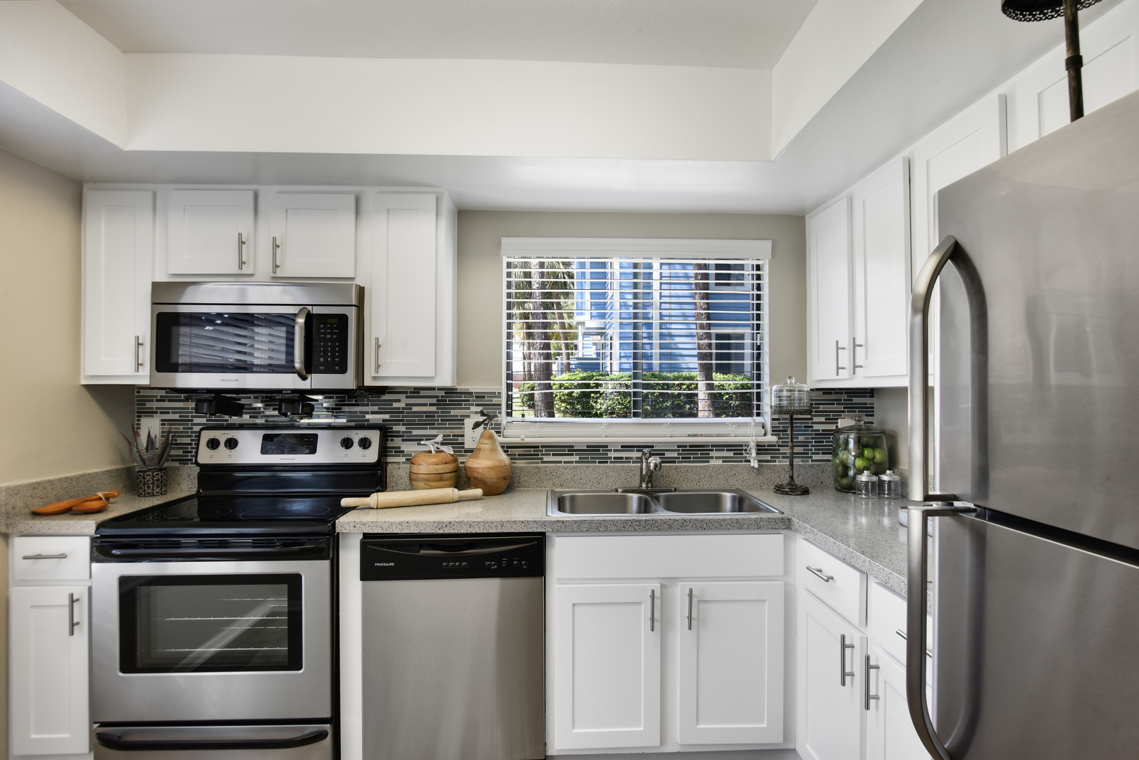 a modern kitchen with stainless steel appliances