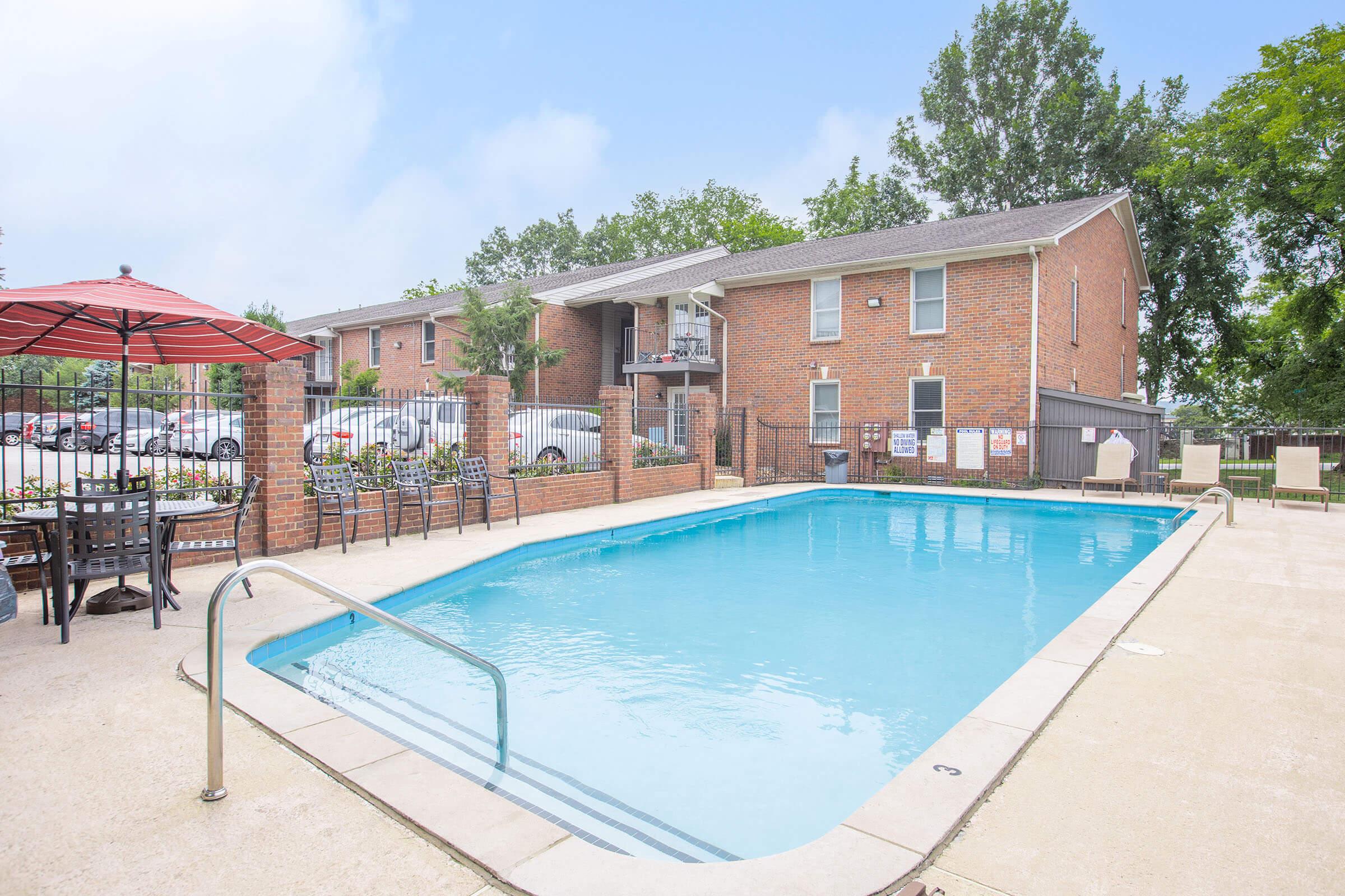 a pool next to a building