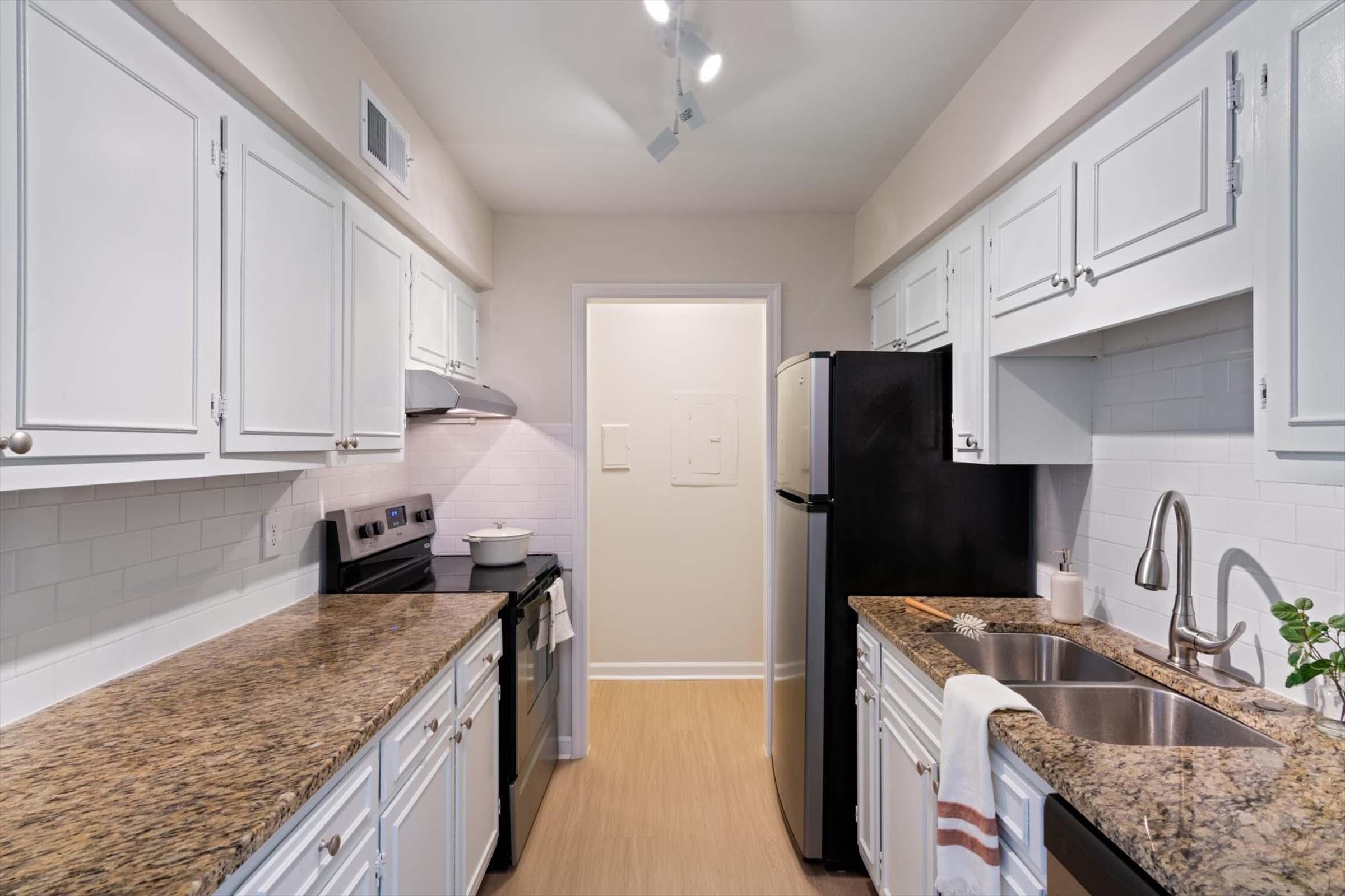 a modern kitchen with stainless steel appliances