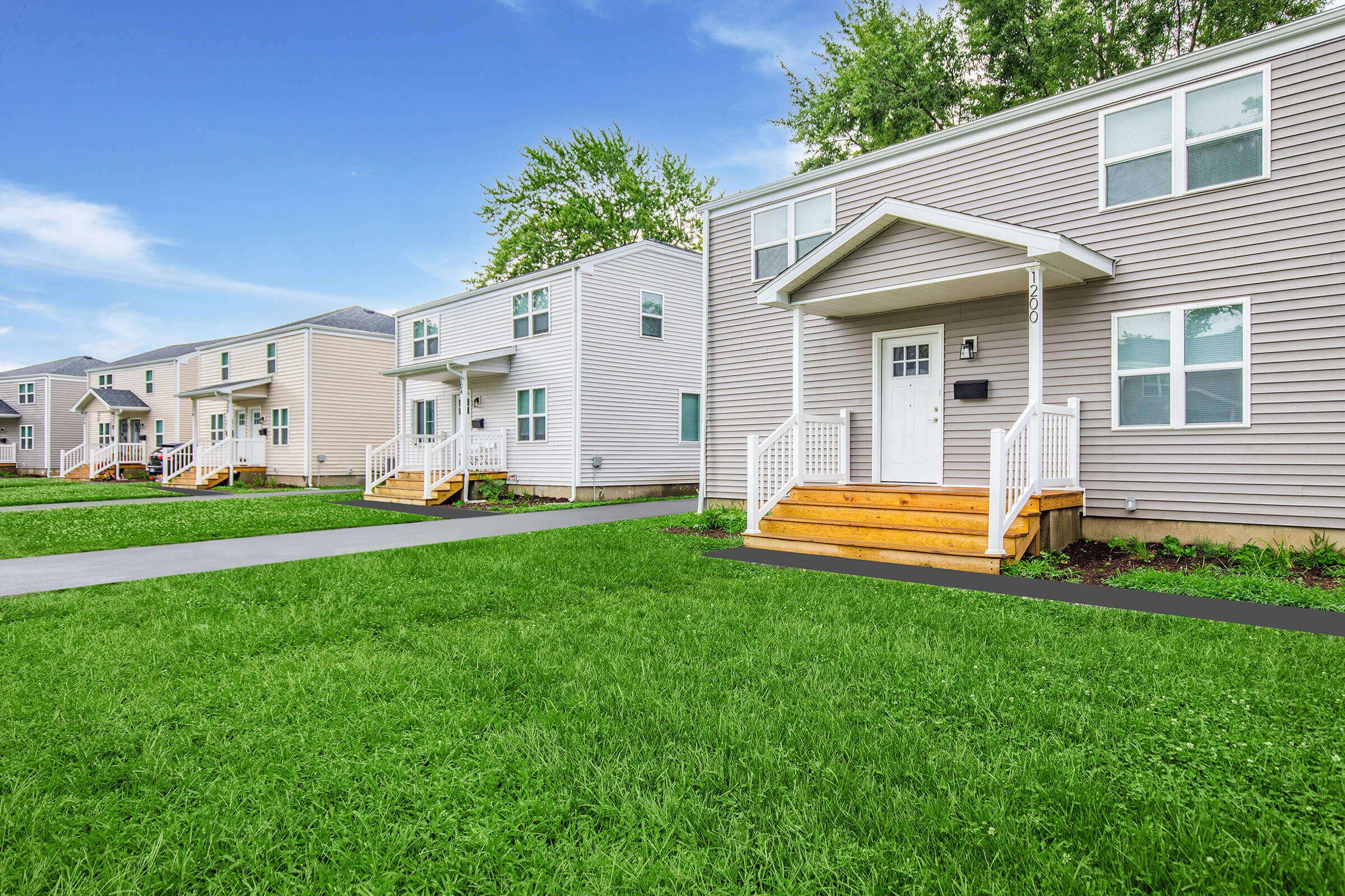 a large lawn in front of a house