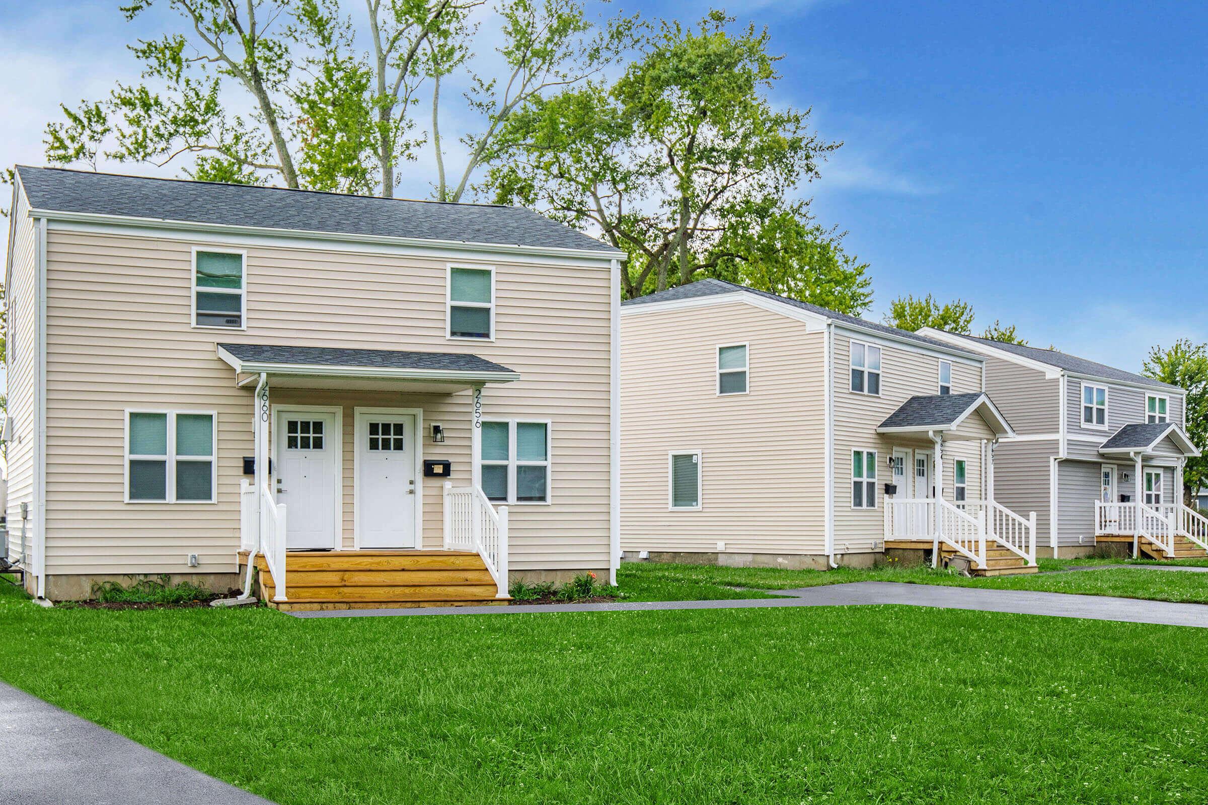 a large lawn in front of a house