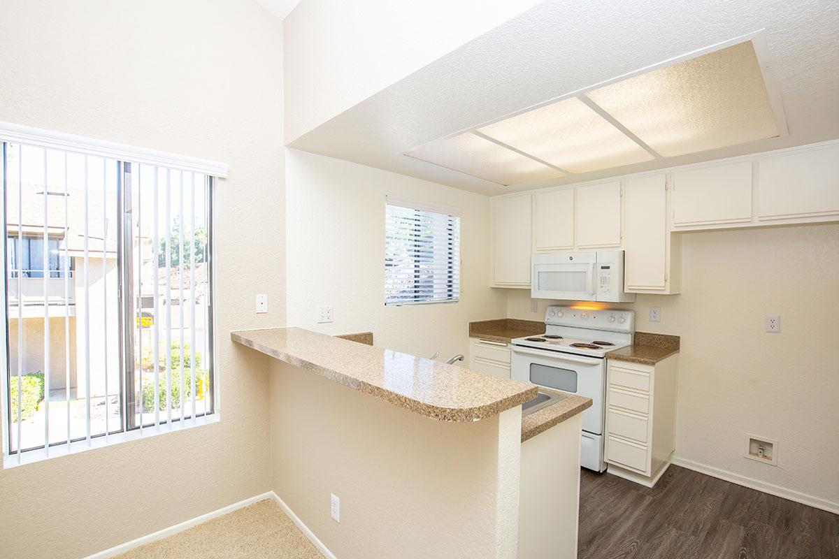 Kitchen and dining room with wooden floors