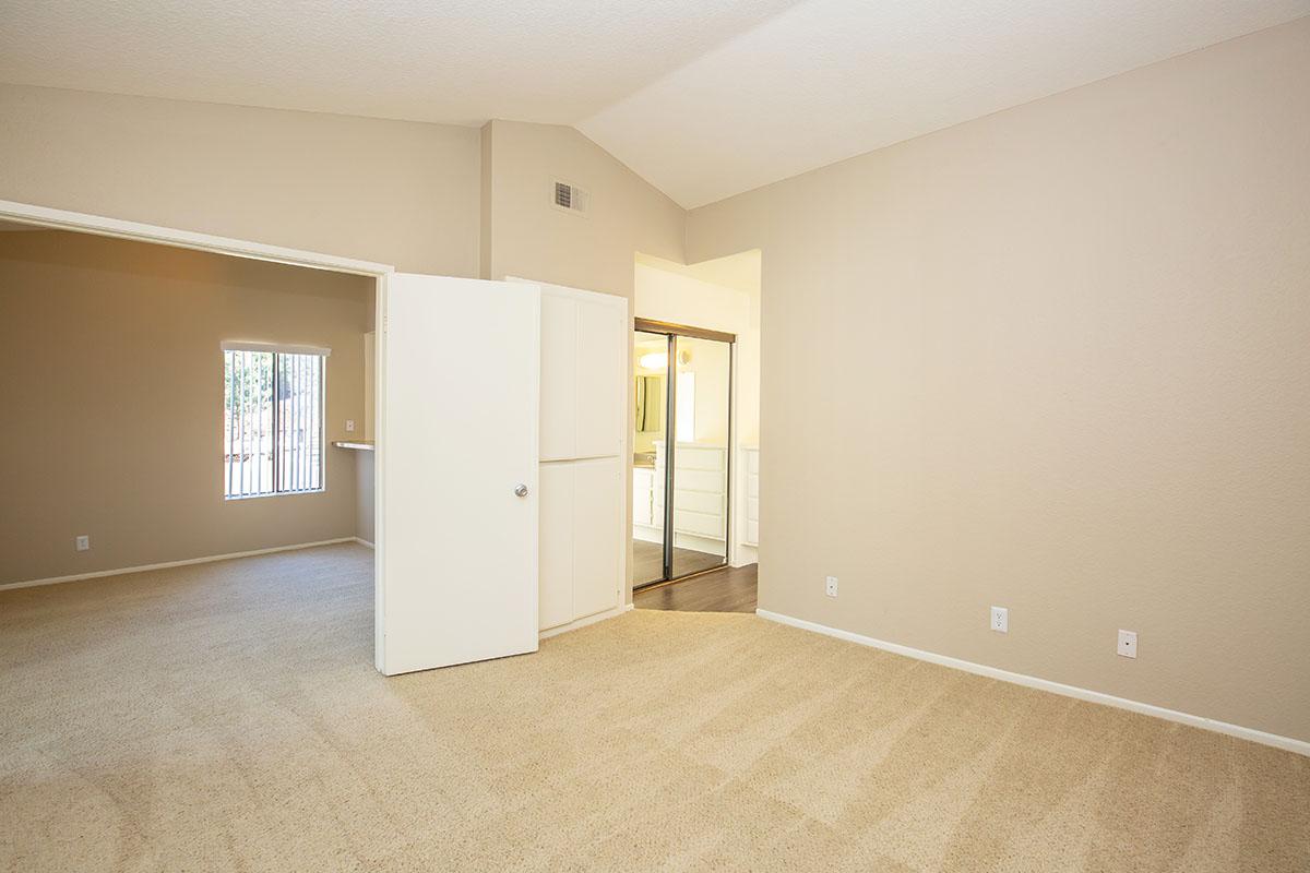 Bedroom and living room with carpet