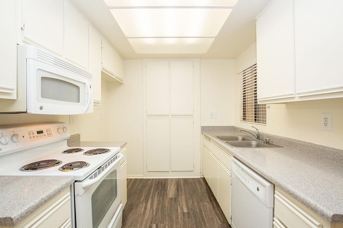 Unfurnished kitchen with wooden floors