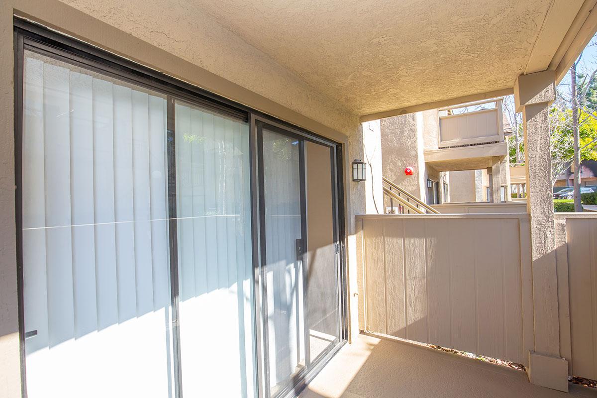 Unfurnished patio with glass sliding doors