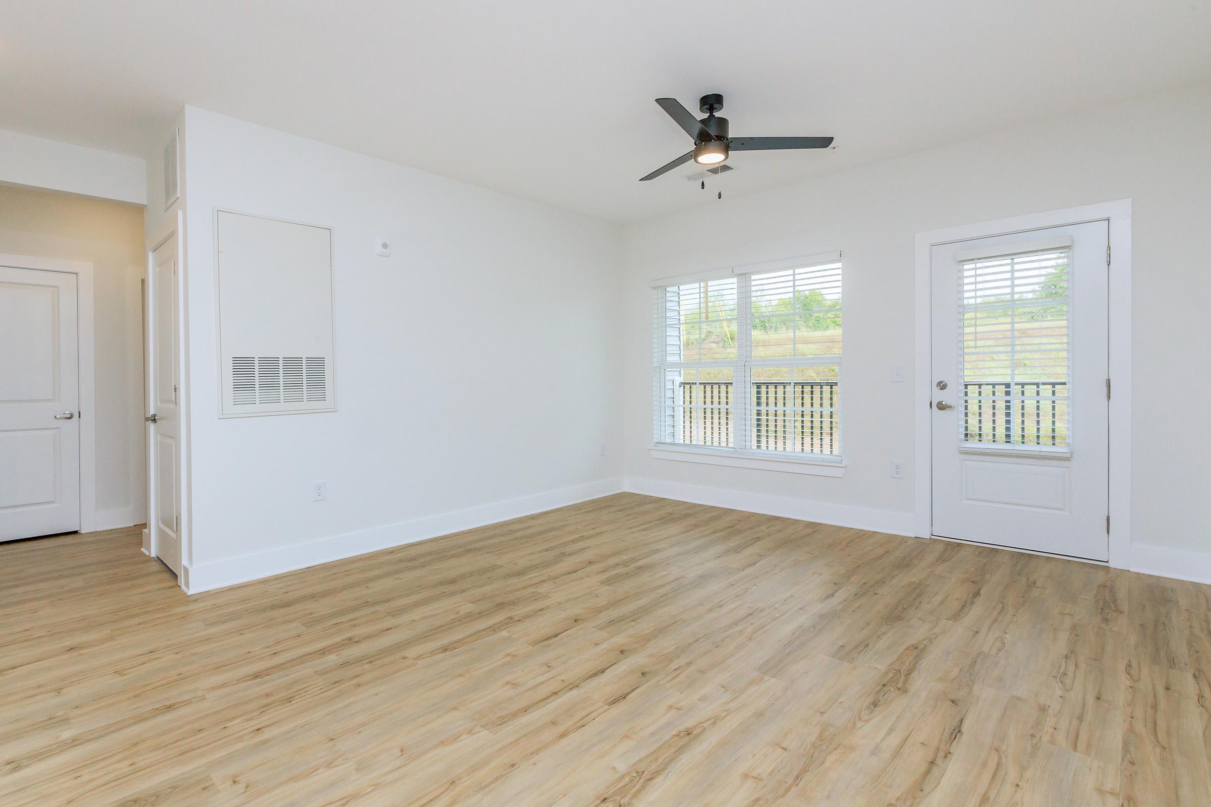 a kitchen with a wood floor