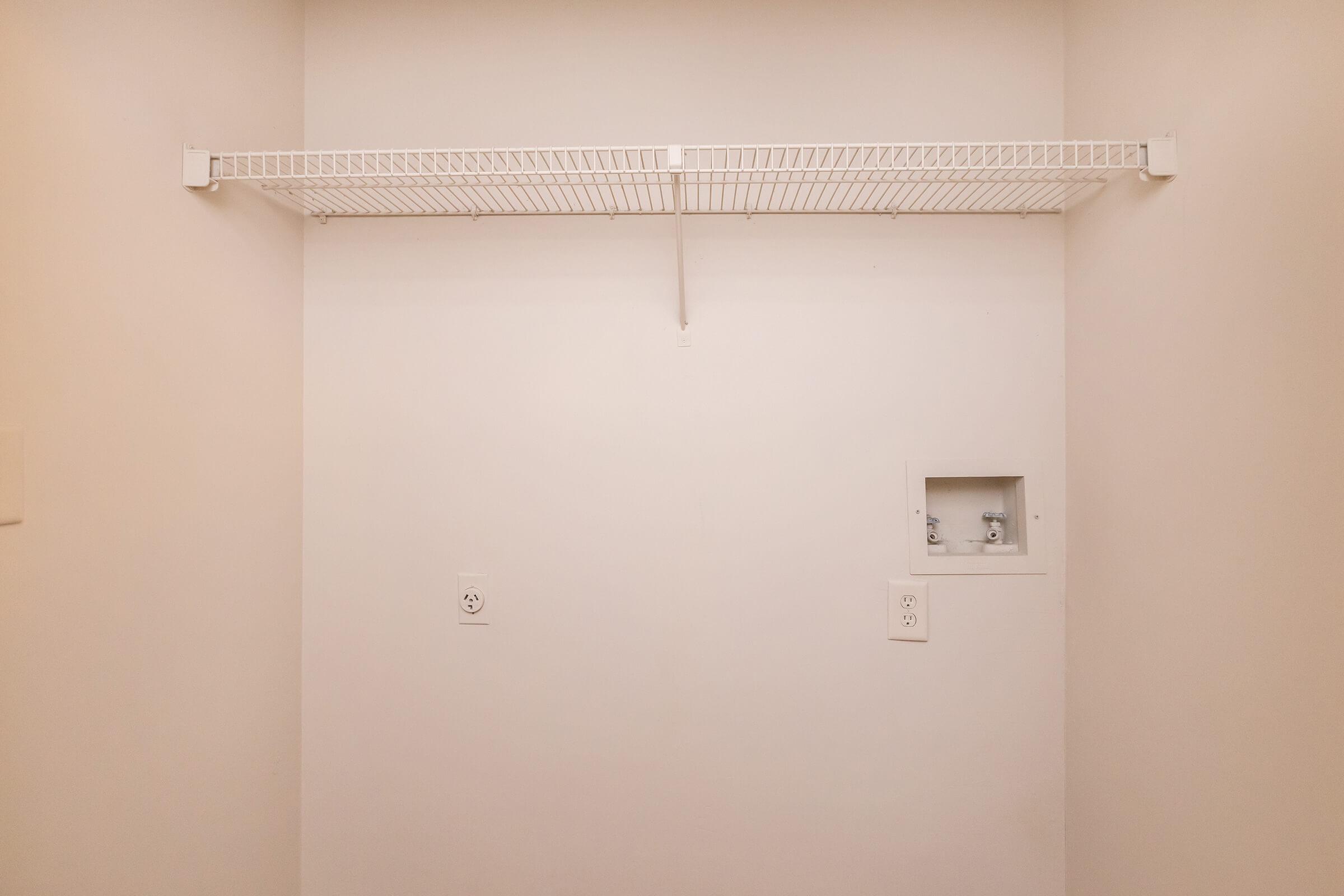 a white refrigerator freezer sitting in a room