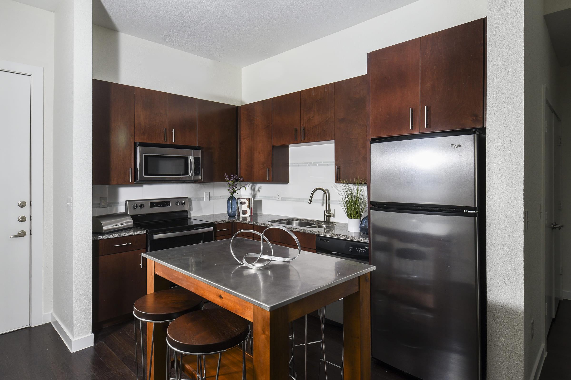 a kitchen with stainless steel appliances