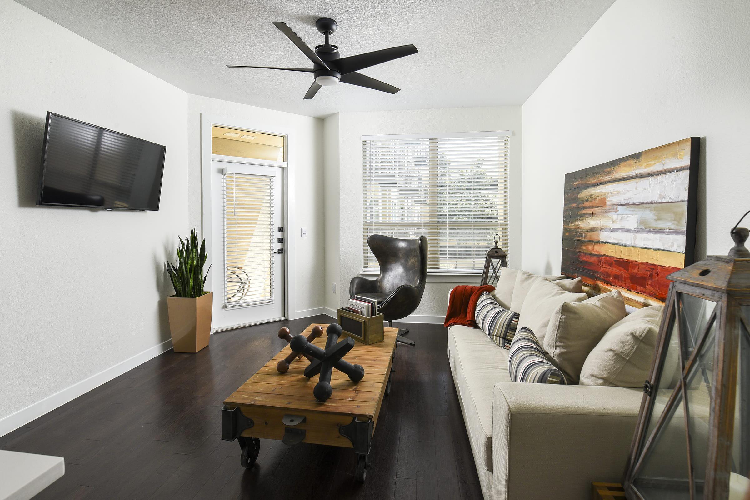 a living room filled with furniture and a fire place