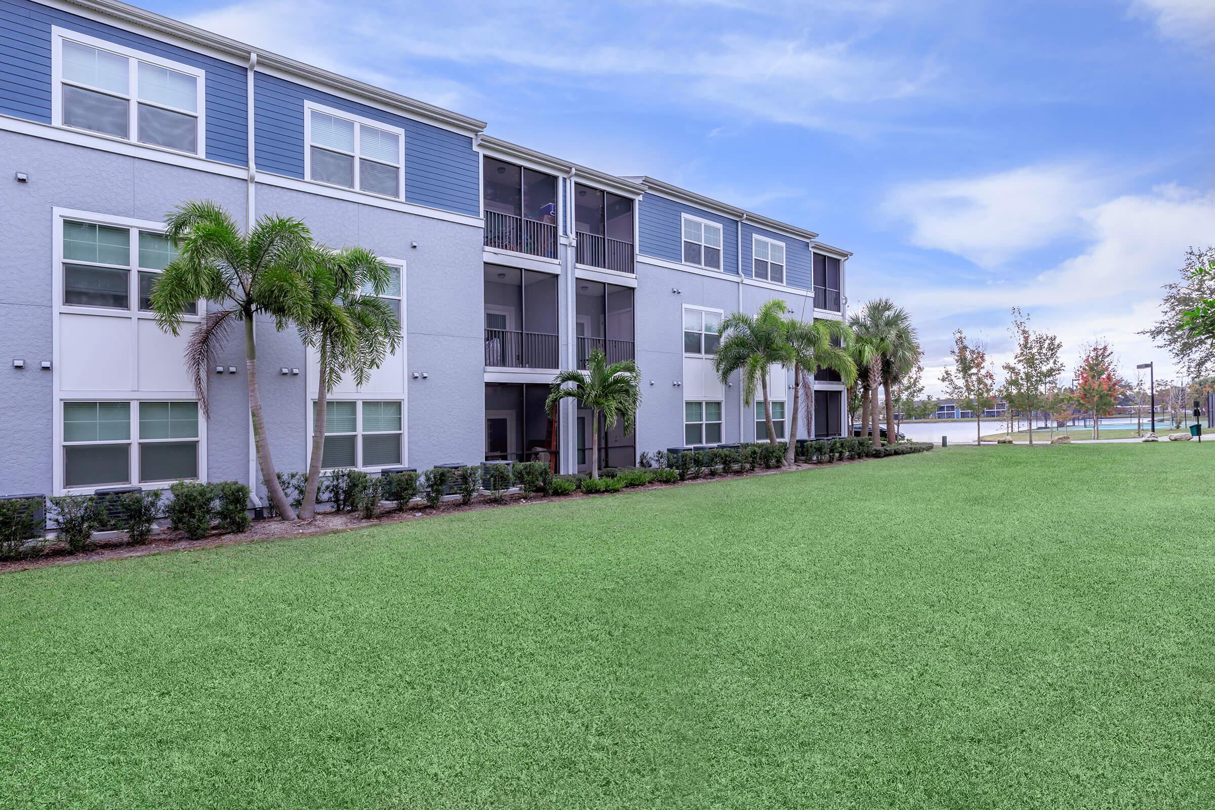 a large lawn in front of a building