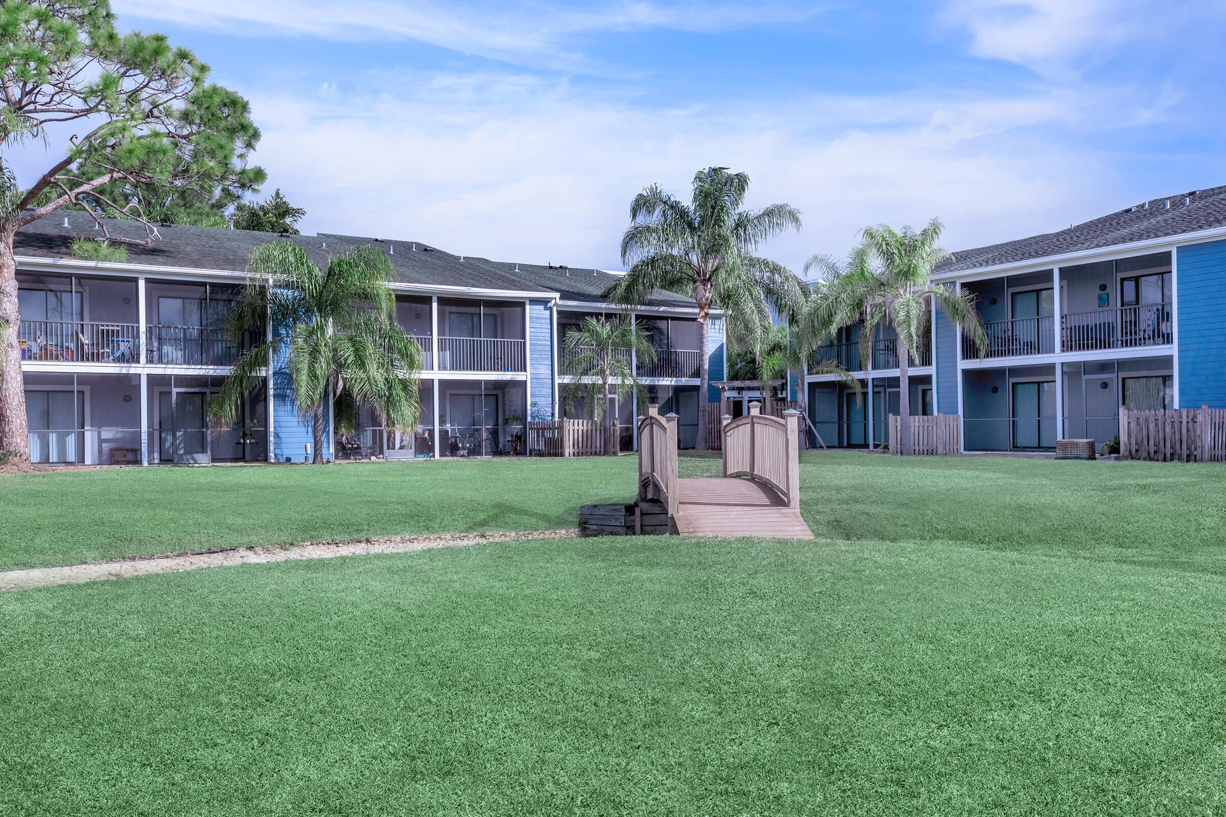 a large lawn in front of a house