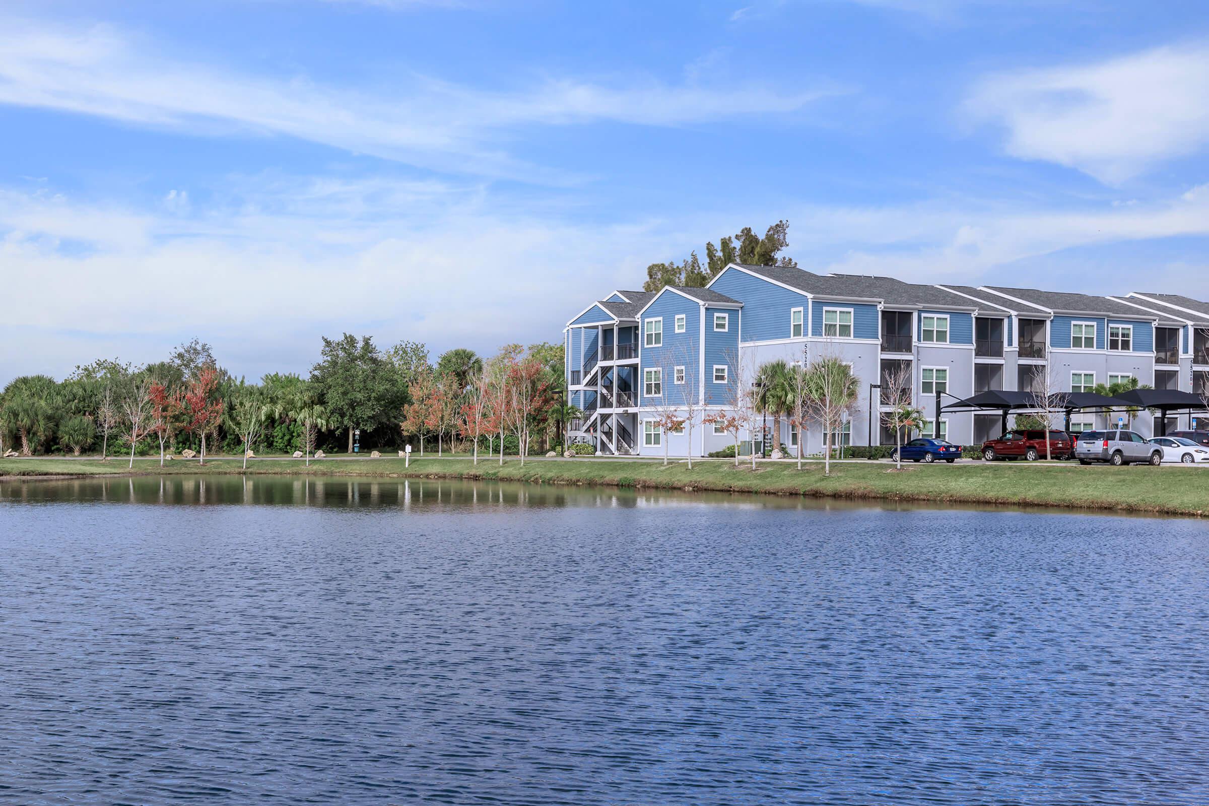 a large body of water in front of a house