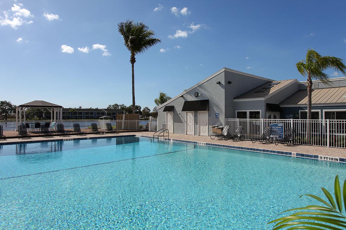 a pool next to a body of water