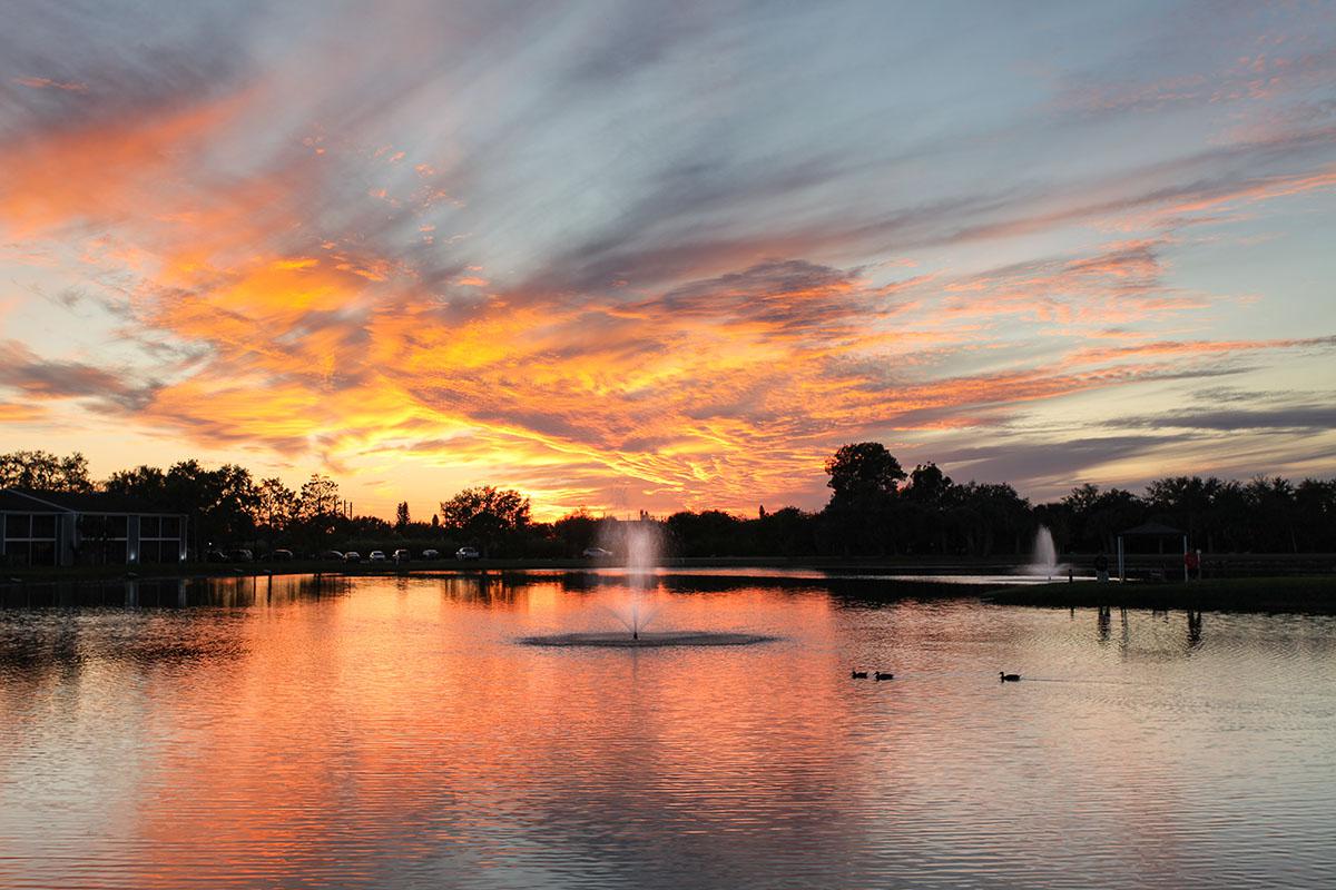 a sunset over a body of water