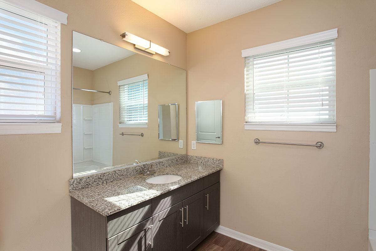 a kitchen with a sink and a window