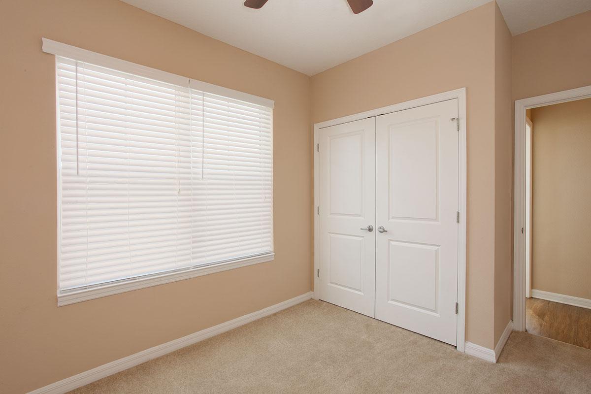 a room with a sink and a window