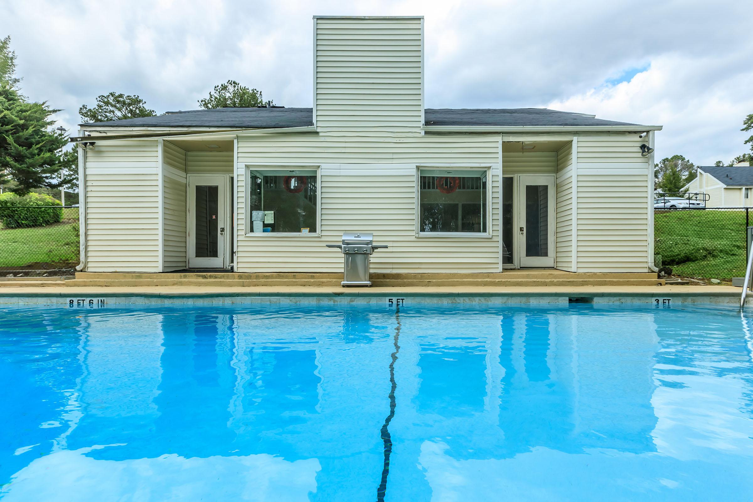 a small house in a pool of water