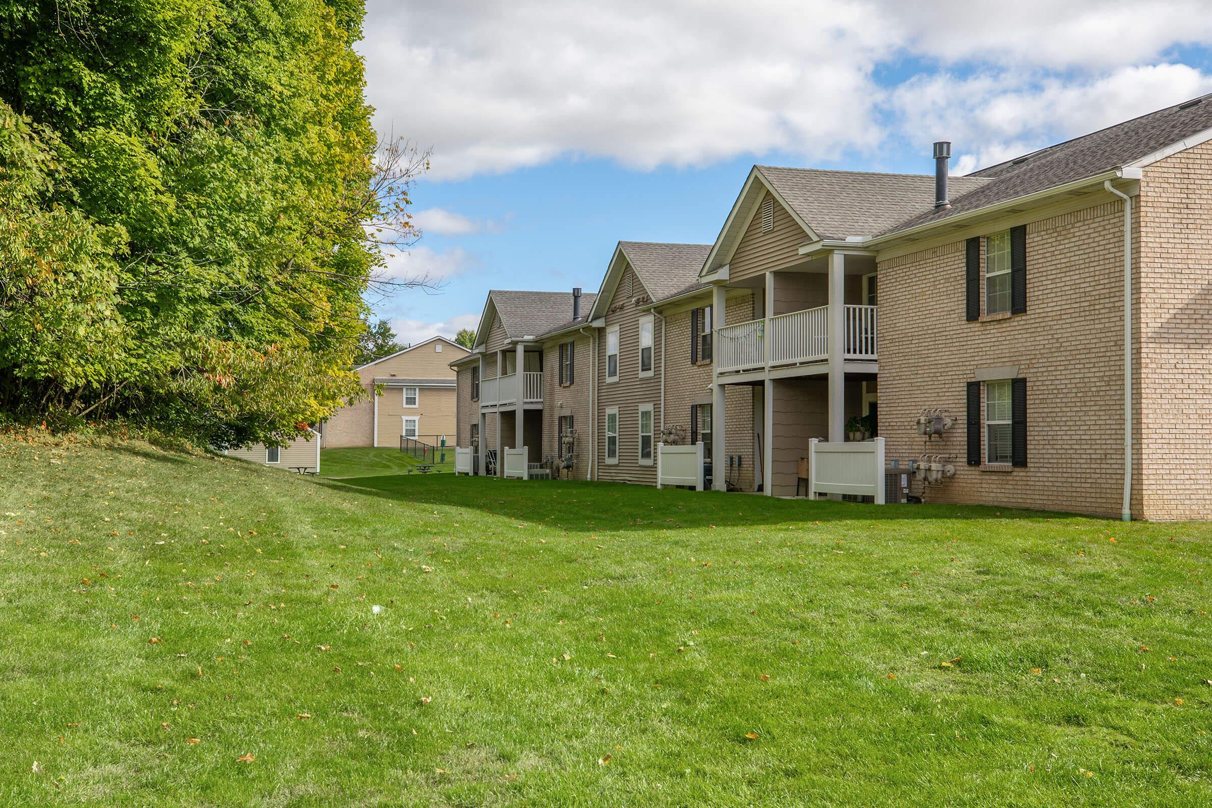 a large lawn in front of a house