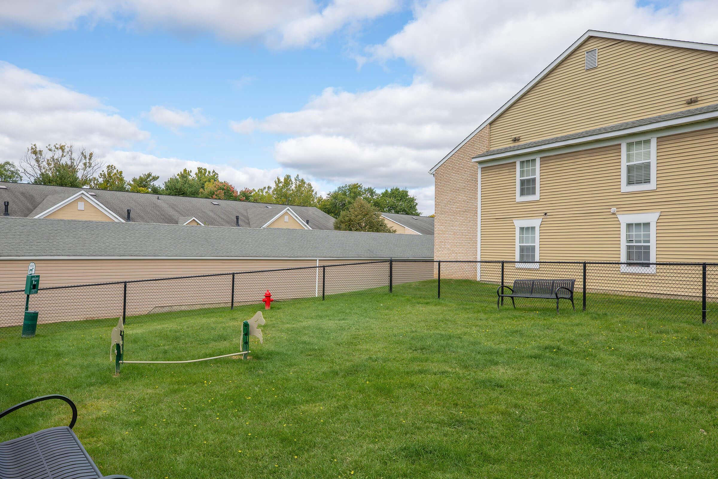 a large lawn in front of a house