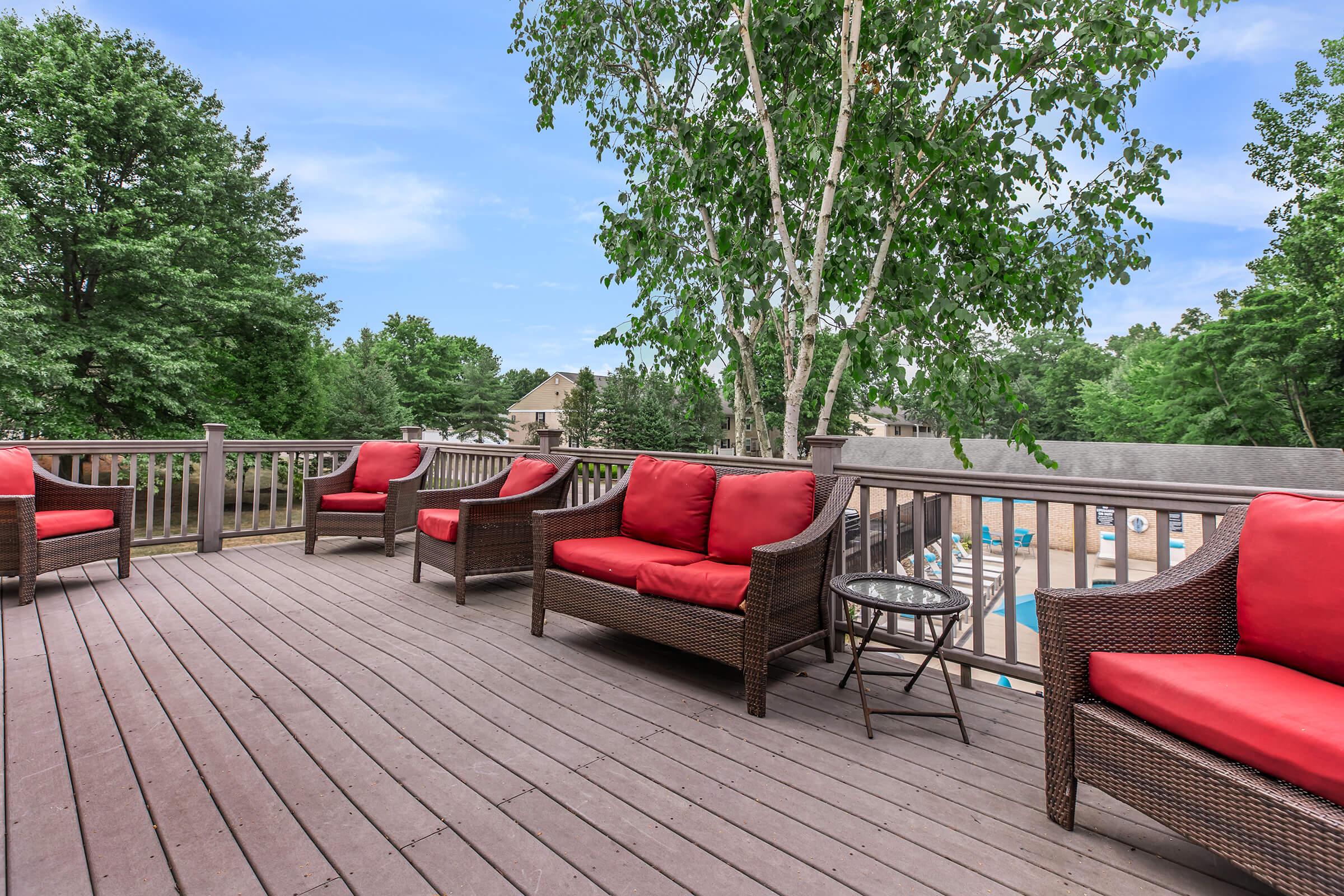 a row of wooden benches sitting on top of a chair