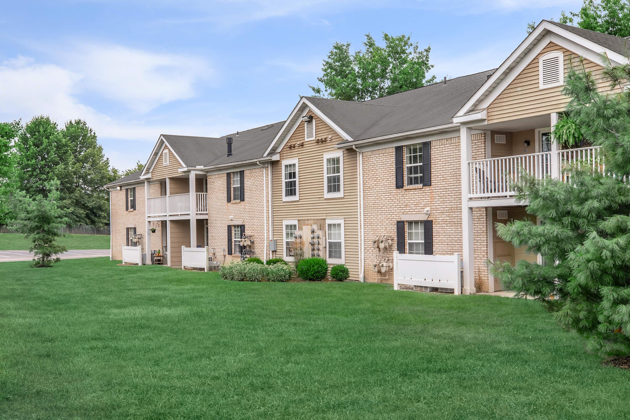 a large lawn in front of a house