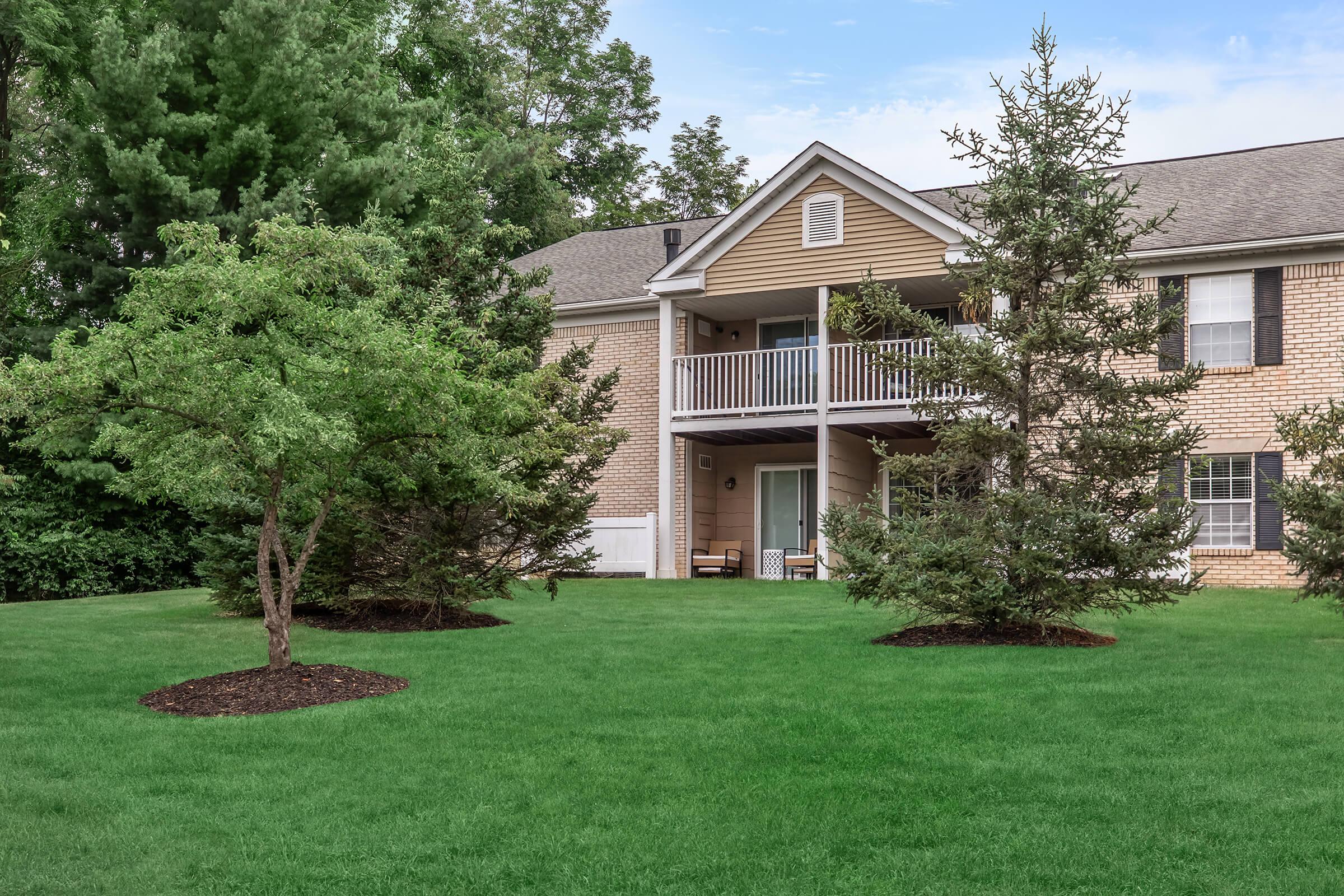 a large lawn in front of a house