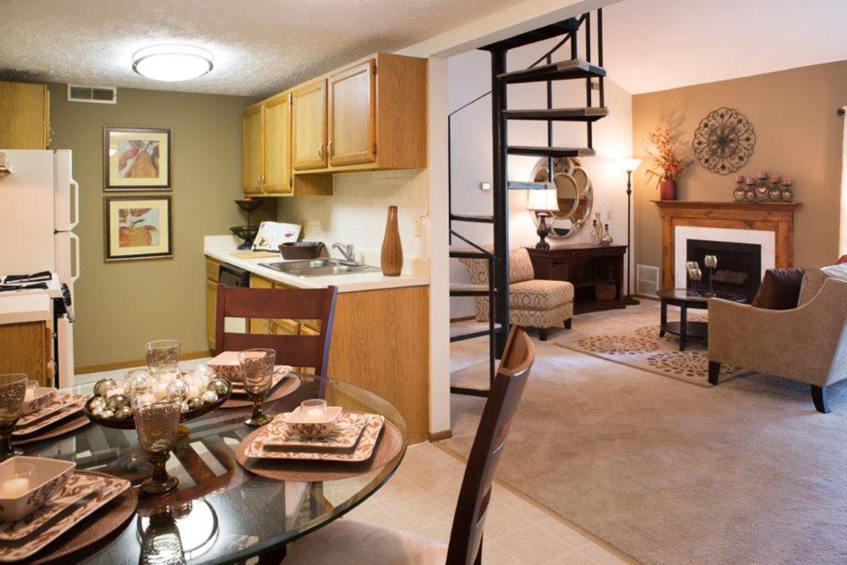 a living room filled with furniture and a fire place
