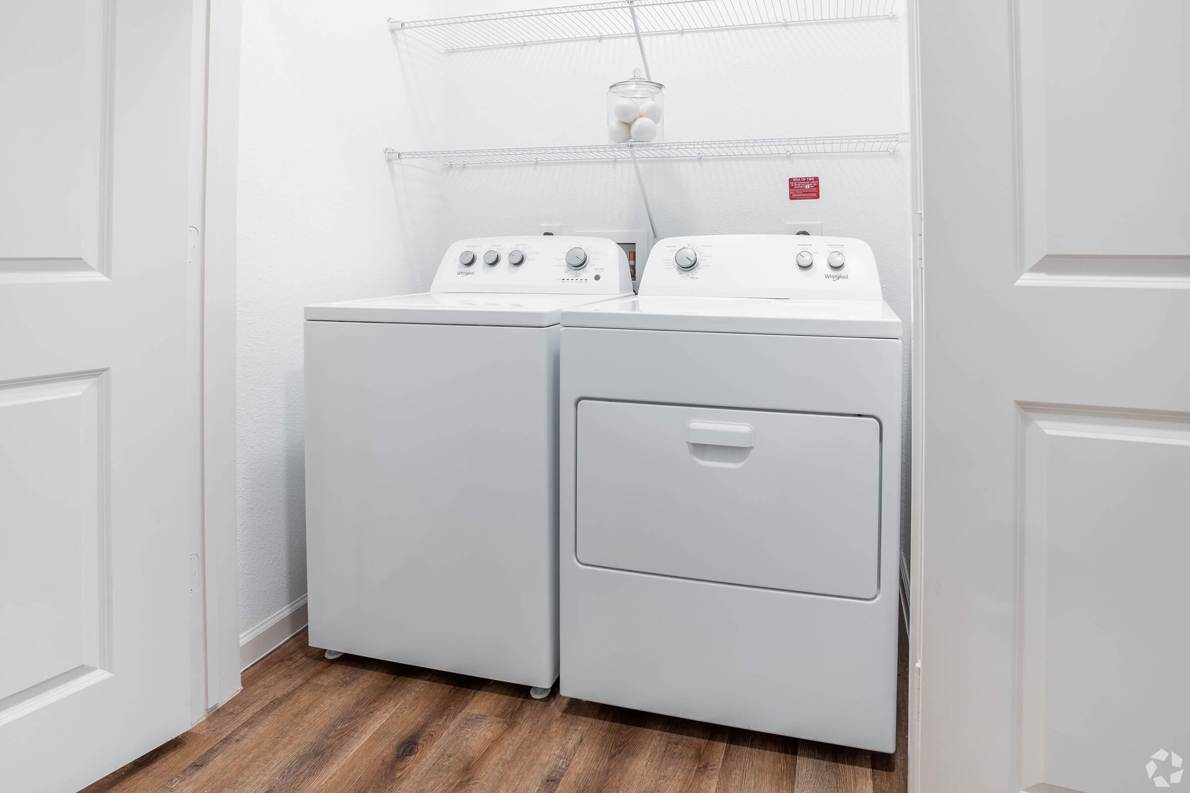 a stove top oven sitting inside of a refrigerator