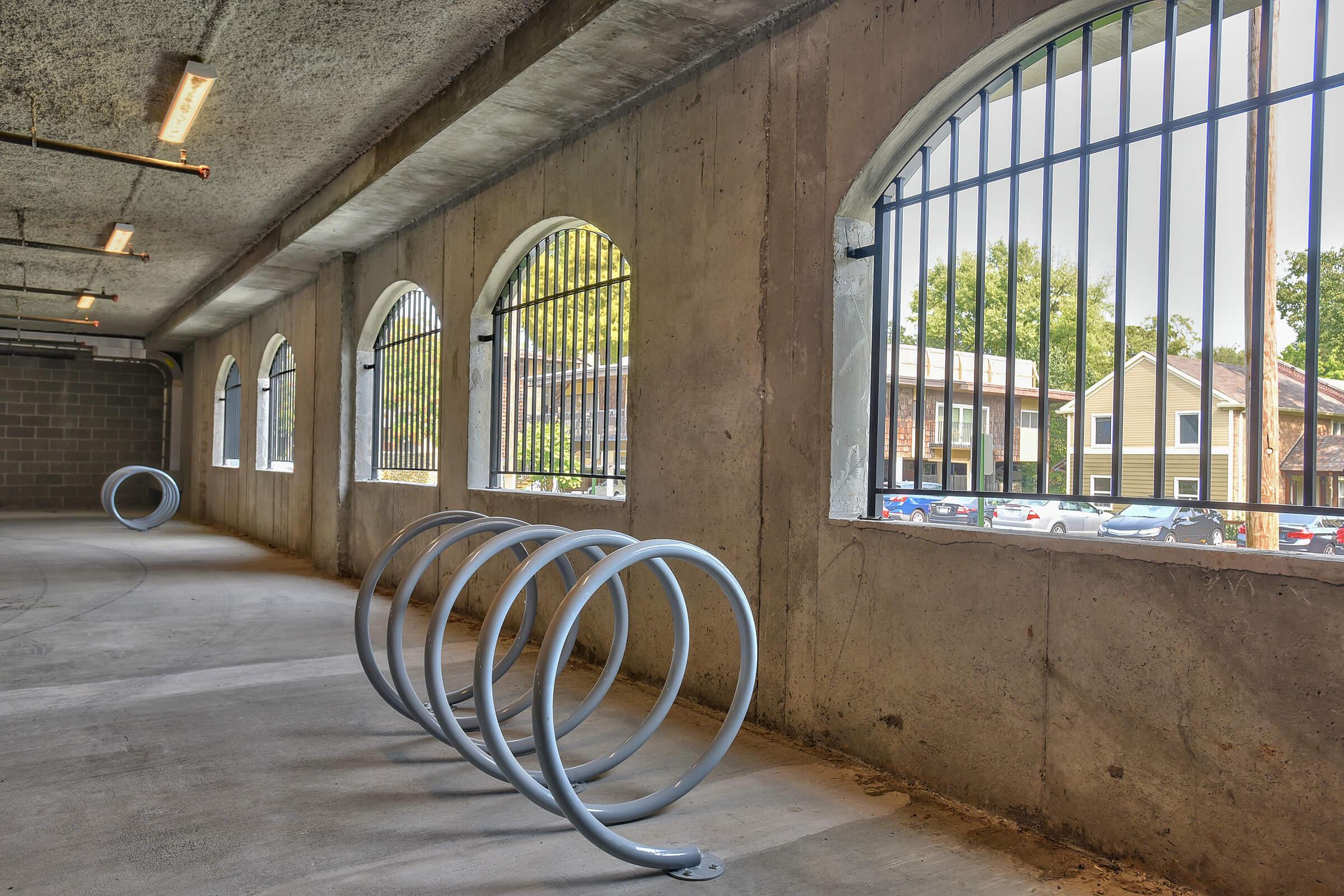 a bicycle parked on the side of a building