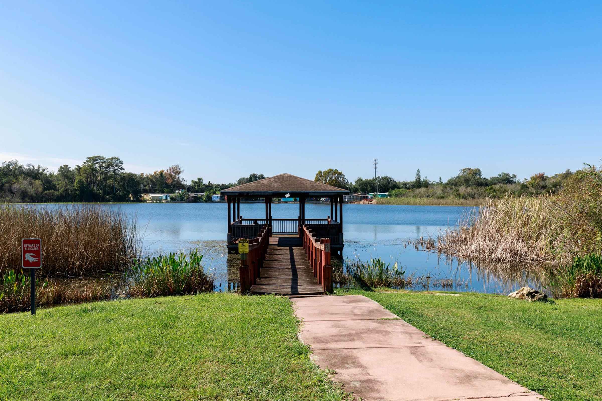 a bench in front of a body of water